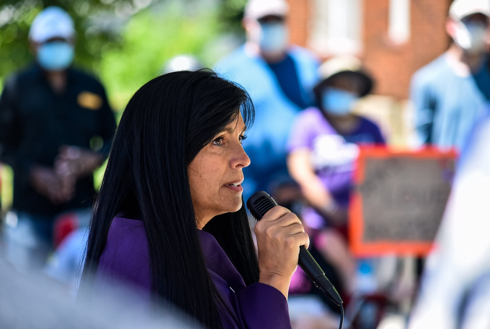 Wendy Waters-Connell, executive director of Hamilton YWCA, speaks during a peaceful prayer vigil Sunday, June 7 at Bailey Square in Hamilton. Over 100 people attended the event that was part of a nationwide surge of rallies over the May 25 death of George Floyd while he was being arrested by Minneapolis police. NICK GRAHAM / STAFF