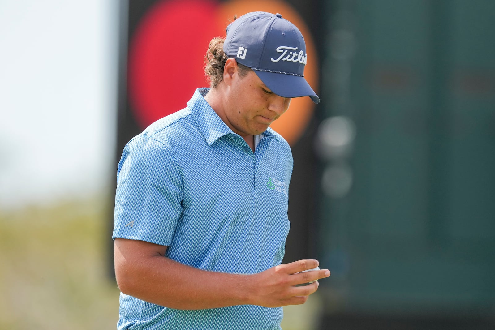 Aldrich Potgieter, of South Africa, reacts to missing a putt on the 11th hole during the third round of the Mexico Open golf tournament in Puerto Vallarta, Mexico, Saturday, Feb. 22, 2025. (AP Photo/Fernando Llano)