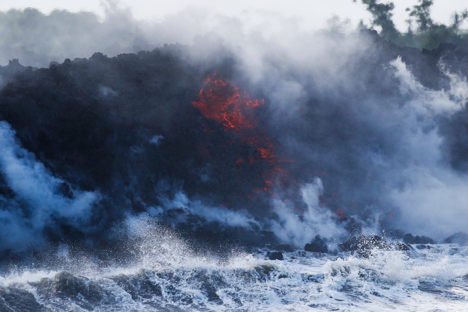 Photos: Hawaii volcano erupts