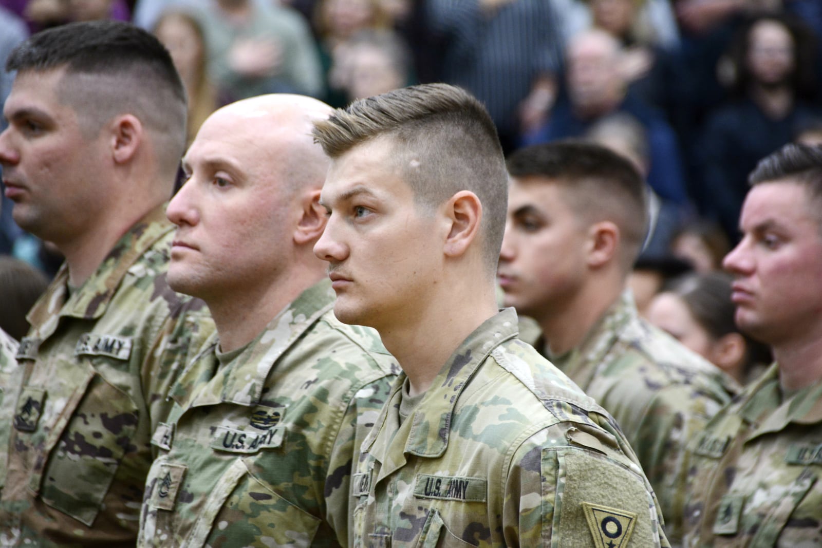 Hundreds of family and friends watched their loved ones during a call of duty ceremony Sunday afternoon, Dec. 8, 2019, at Edgewood Middle School on Trenton-Oxford Road. The soldiers of the 324th Military Police Co. in Middletown will serve a year-long deployment in support of the U.S. Southern Command operations. MICHAEL D. PITMAN/STAFF