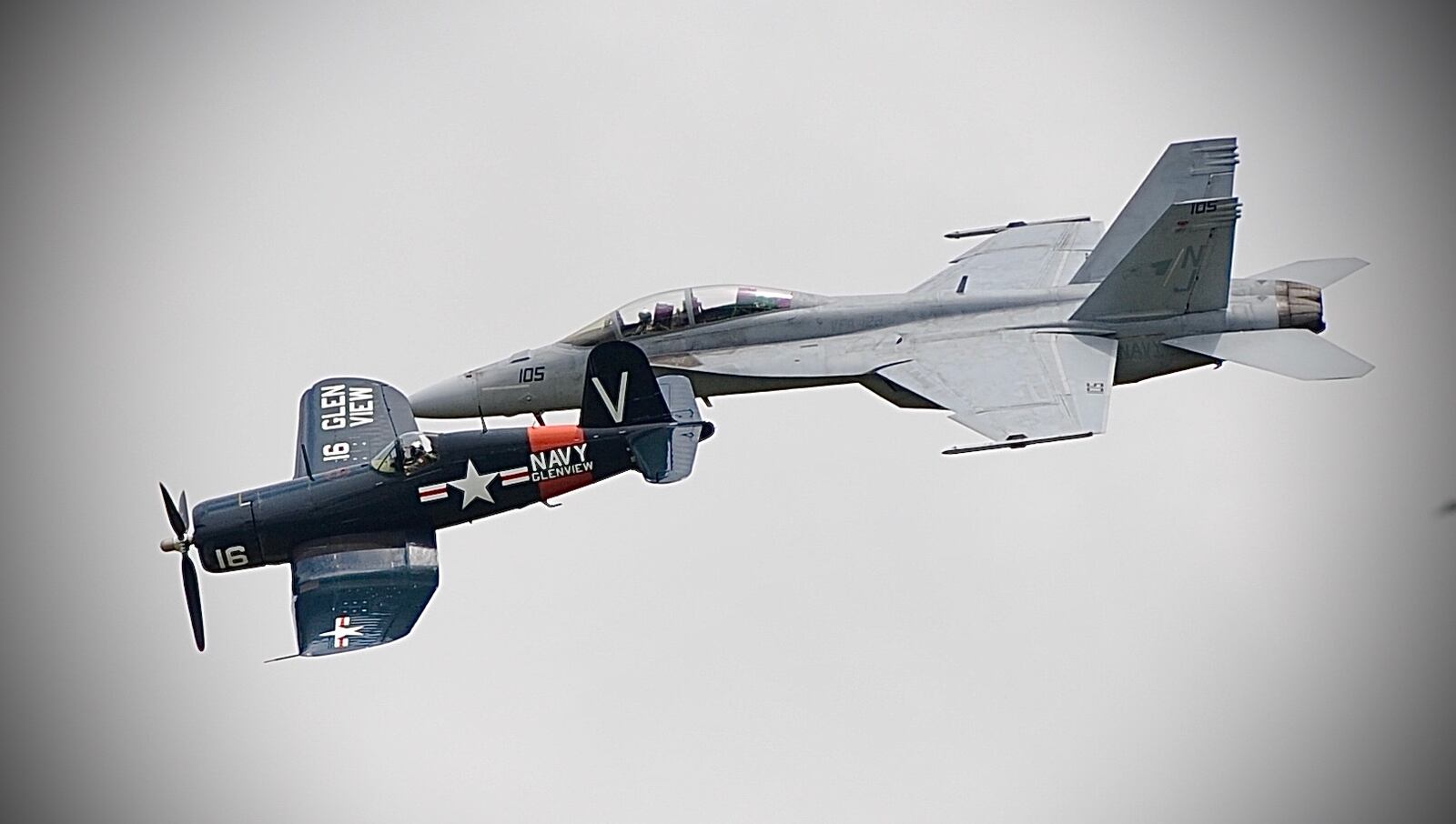 U.S. Navy F-18 Demonstration with vintage Corsair at the CenterPoint Energy Air Show Friday July 9, 2021. MARSHALL GORBY\STAFF