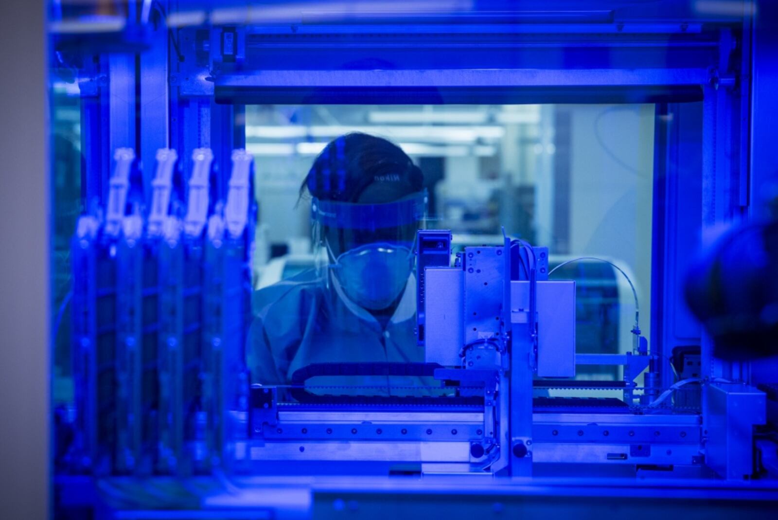 Staff Sgt. Alexis Shodeke, a medical laboratory technician in the U.S. Air Force School of Aerospace Medicine’s Epidemiology Laboratory, observes as new samples are tested for COVID-19 in June. The Epi Lab is the sole clinical reference lab in the Air Force, and USAFSAM is part of AFRL’s 711th Human Performance Wing headquartered at Wright-Patterson Air Force Base. (U.S. Air Force photo by Richard Eldridge)