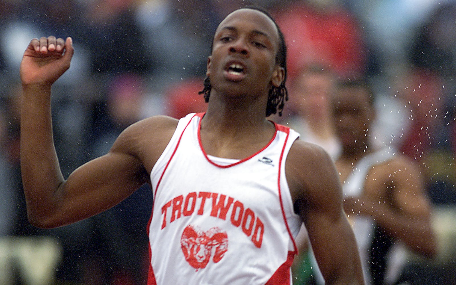  Trotwood's Zach Logan wins the Boys 400 meter dash during the Don Mitchell Roosevelt Memorial in 2004. FILE