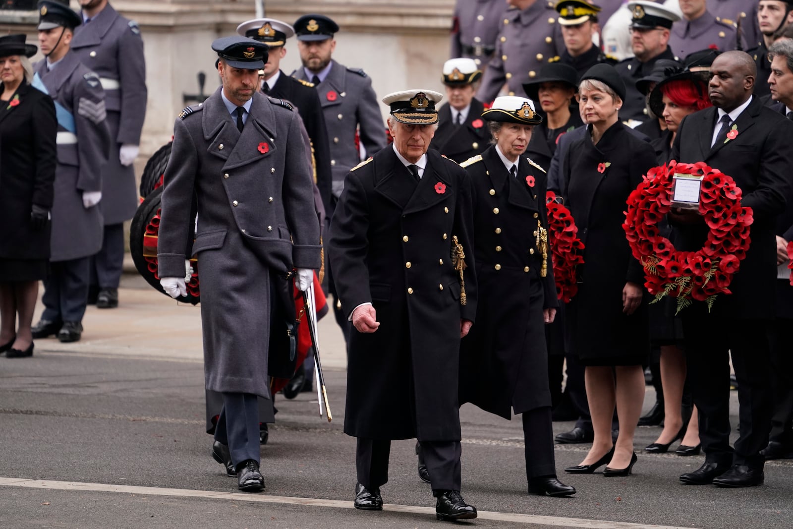 Britain's King Charles III, centre, with Prince William ,left, and Princess Anne attend the Remembrance Sunday Service at the Cenotaph in London, Sunday, Nov. 10, 2024. (AP Photo/Alberto Pezzali, Pool)