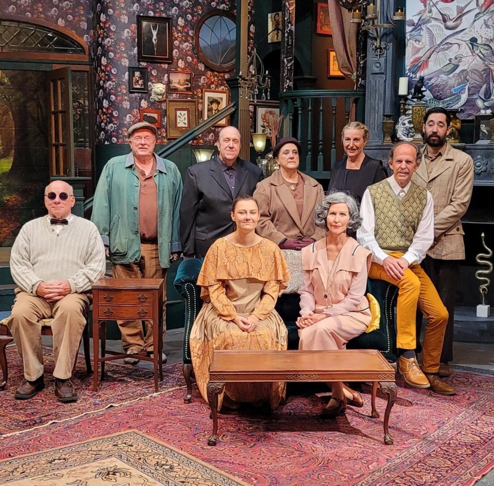 Left to right: (Front row) David Williamson (Major Murray Hillgrove), Racheal Tingley (Laura Pennington), Caitlin Larsen Deer (Mrs. Violet Smallwood), (Back row), John Spitler (Rigg), Don Campbell (Rev. Charles Corsellis), Rhea Smith (Mrs. Penny Corsellis), Karen Righter (Mrs. Minnett), Jim Walker (Mr. Rupert Smallwood), and Frank Maranje (Oliver Bashforth) in Dayton Theatre Guild's production of "The Enchanted Cottage." PHOTO BY RICK FLYNN