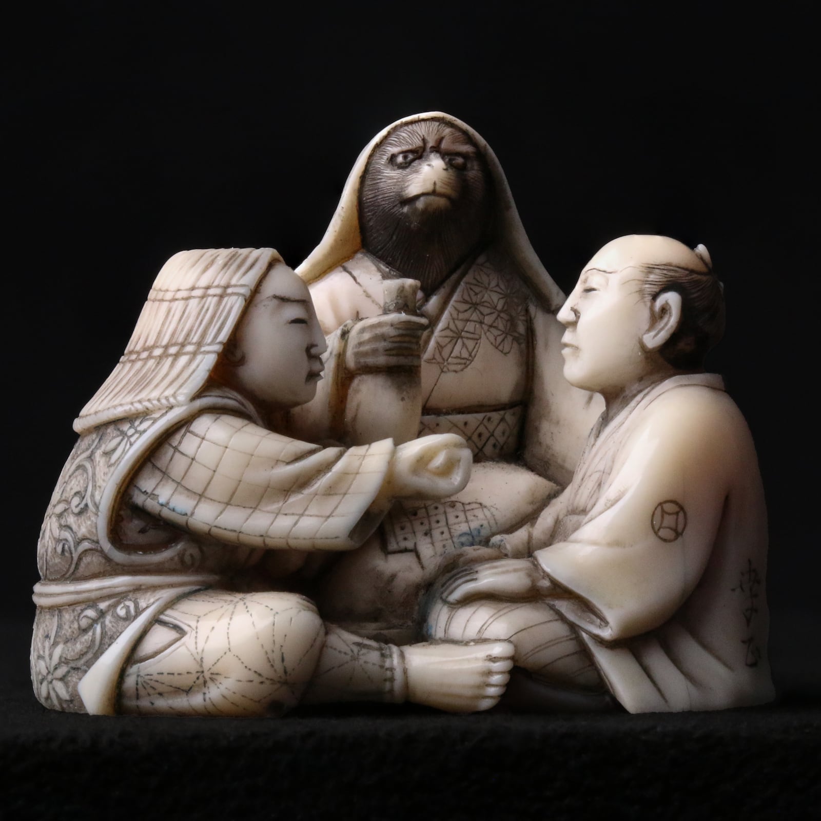 Netsuke in the shape of a scene with a shape-shifting Tanuki. CONTRIBUTED