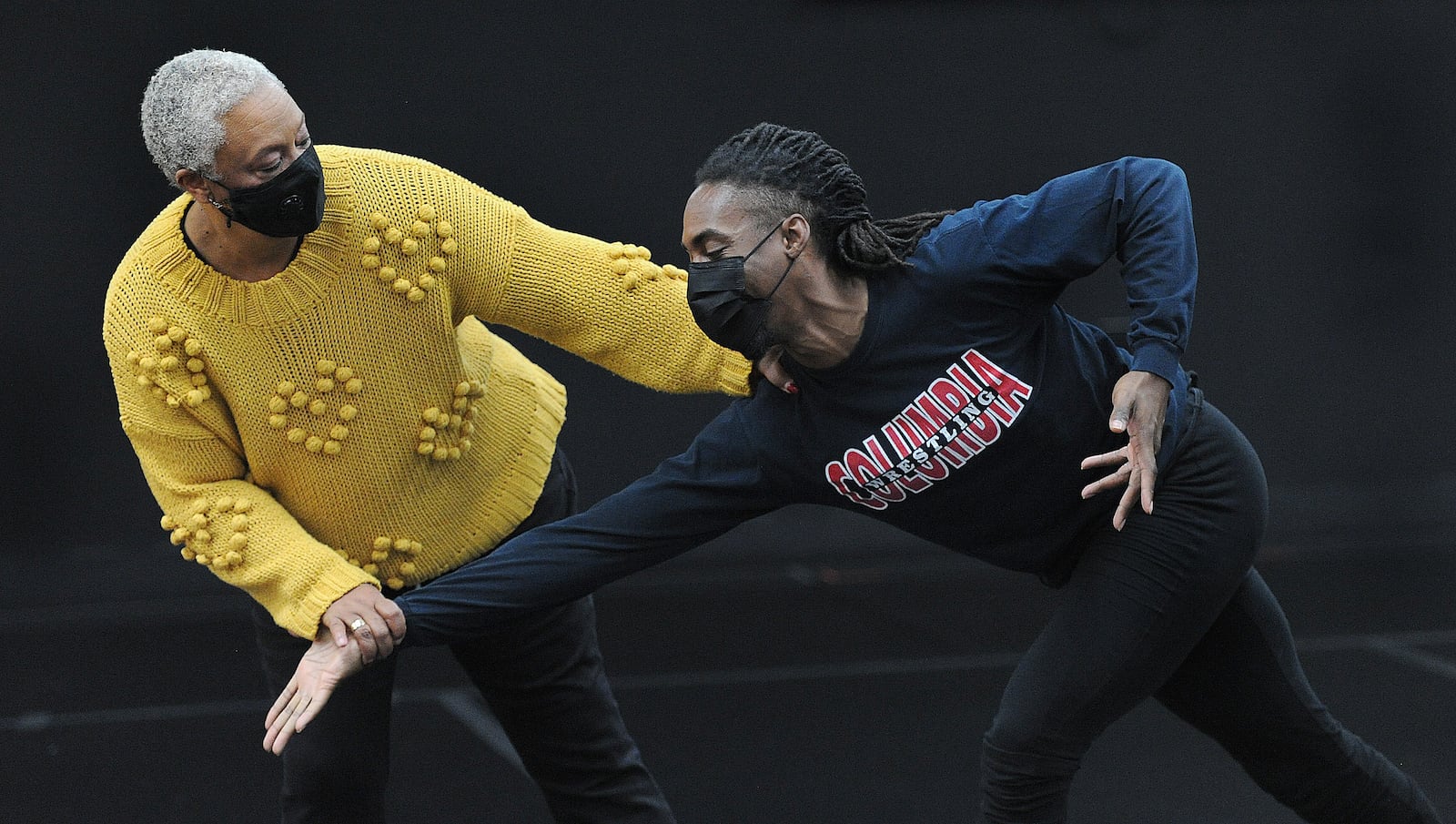 DCDC Artistic Director Debbie Blunden-Diggs works with the company dancers Thursday Feb. 10, 2022. MARSHALL GORBY\STAFF