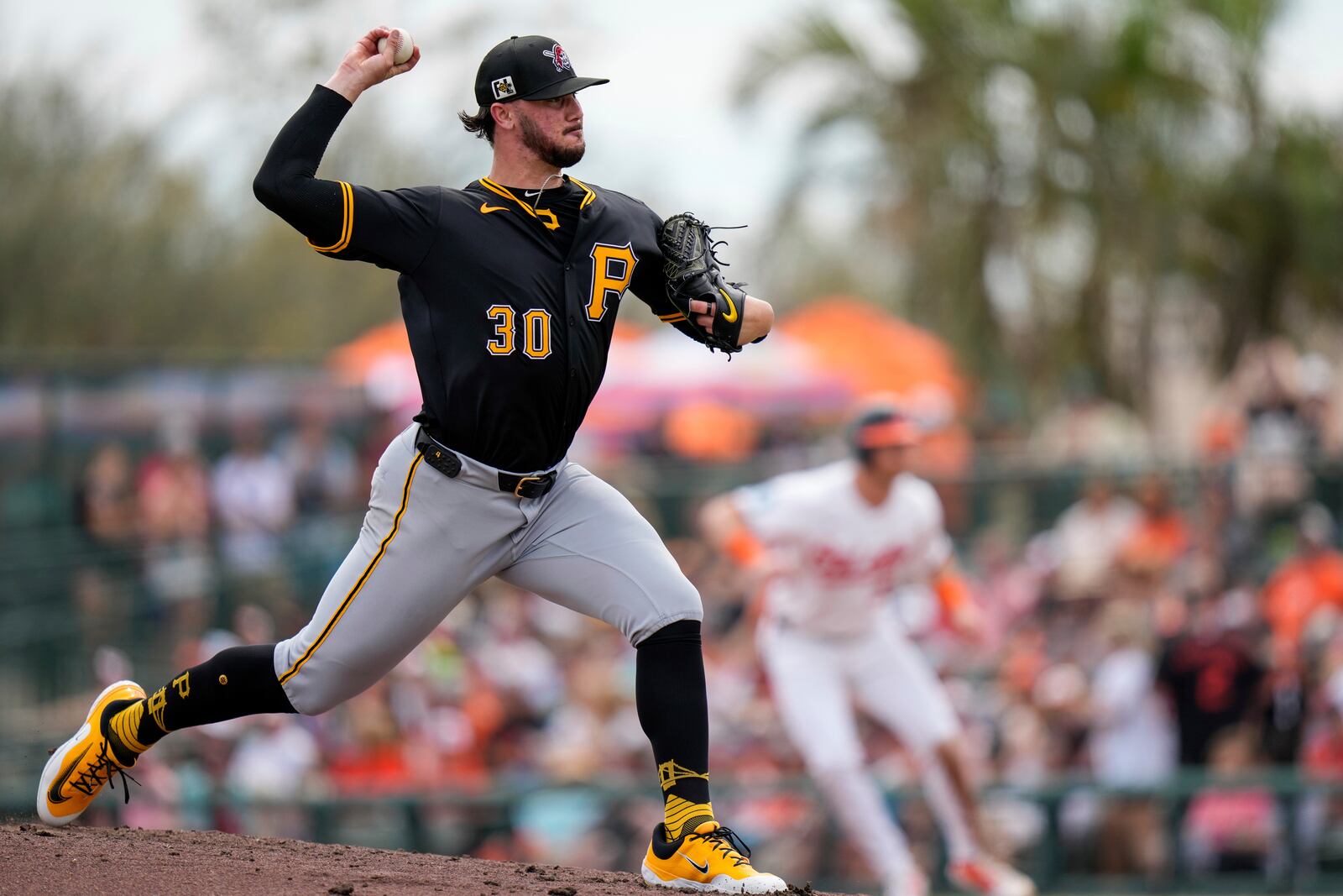 Pittsburgh Pirates starting pitcher Paul Skenes delivers during the third inning of a spring training baseball game against the Baltimore Orioles, Saturday, March 1, 2025, in Sarasota, Fla. (AP Photo/Stephanie Scarbrough)