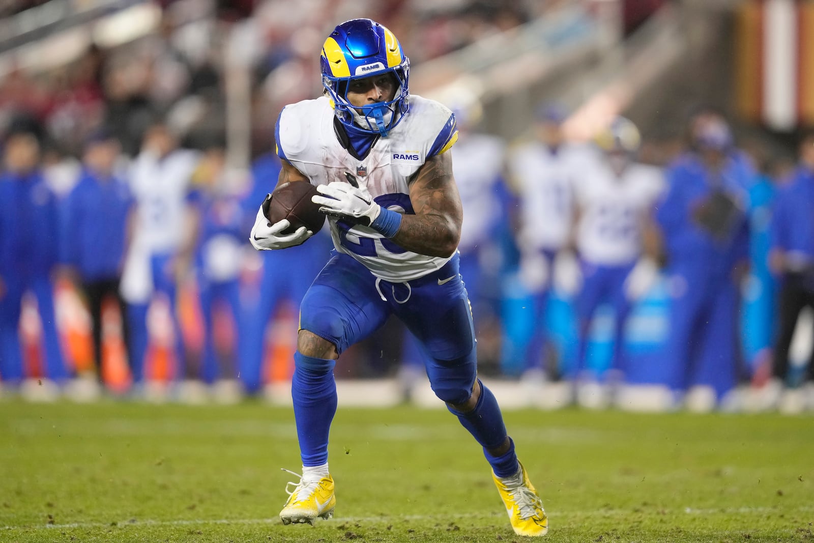 Los Angeles Rams running back Kyren Williams runs against the San Francisco 49ers during the second half of an NFL football game in Santa Clara, Calif., Thursday, Dec. 12, 2024. (AP Photo/Godofredo A. Vásquez)