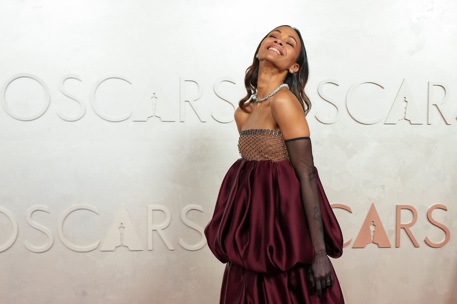 Zoe Saldana arrives at the Oscars on Sunday, March 2, 2025, at the Dolby Theatre in Los Angeles. (AP Photo/Jae C. Hong)