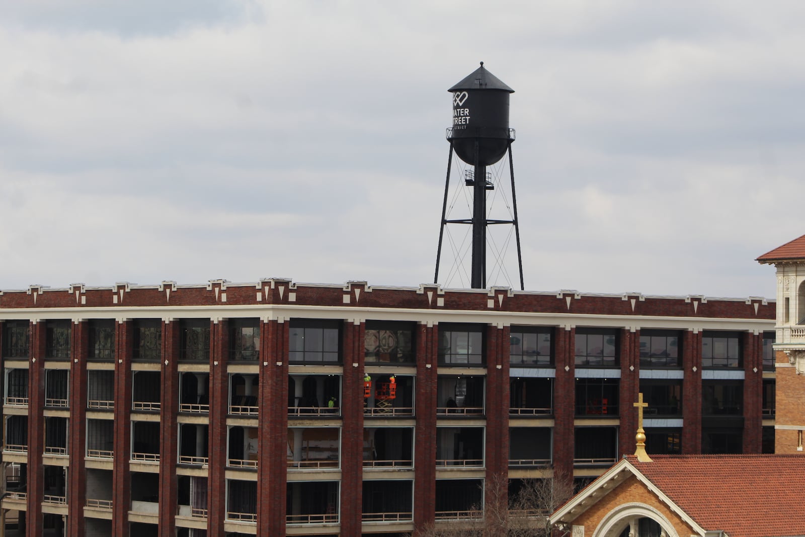 The Delco, the former Mendelsons building, is being rehabbed into a variety of new uses, including apartments, offices, retail space and parking. CORNELIUS FROLIK / STAFF