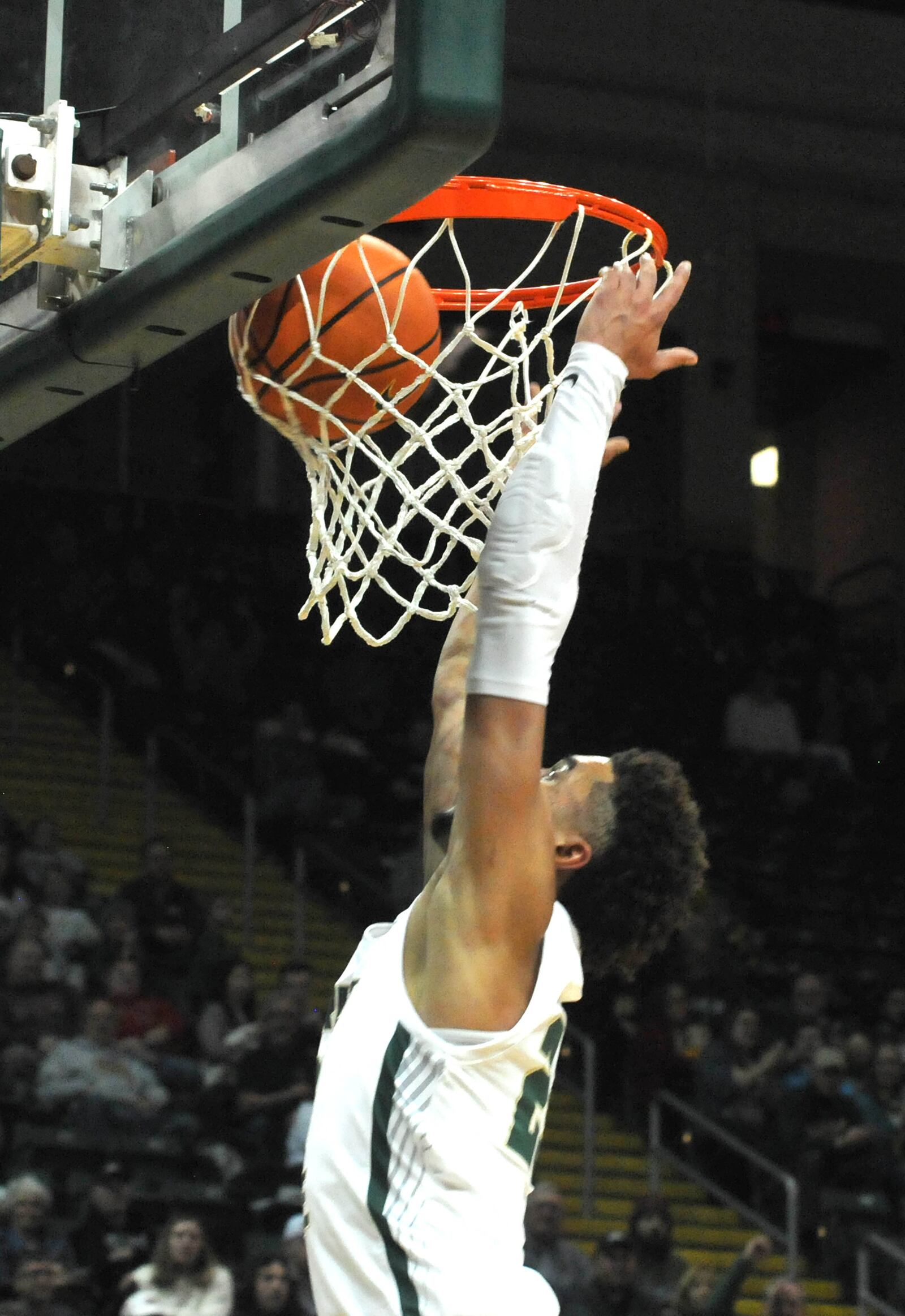 Wright State's Tanner Holden dunks the ball during the first half of a nonconference game against visiting Miami on Tuesday, Dec. 19. DAVID A. MOODIE/CONTRIBUTING PHOTOGRAPHER