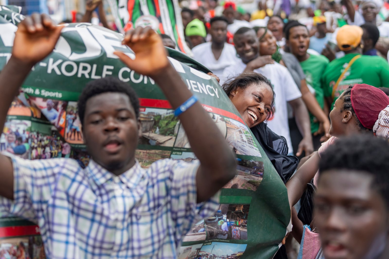 Supporters of opposition candidate and former President John Dramani Mahama celebrate his victory after his opponent Ghana’s vice president and ruling party candidate, Mahamudu Bawumia conceded in Accra, Ghana, Sunday, December 8, 2024. (AP Photo/Jerome Delay)