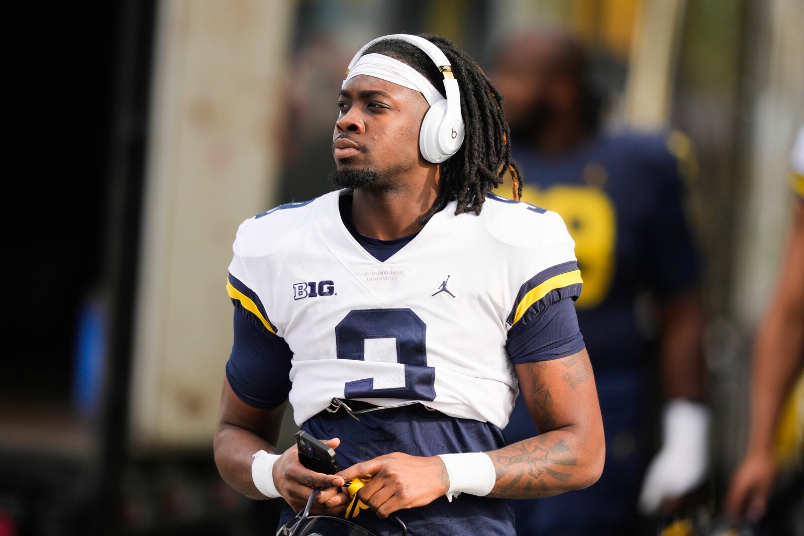 Michigan defensive back Rod Moore walks into practice Friday, Dec. 29, 2023, in Carson, Calif. Michigan is scheduled to play against Alabama on New Year's Day in the Rose Bowl, a semifinal in the College Football Playoff. (AP Photo/Ryan Sun)