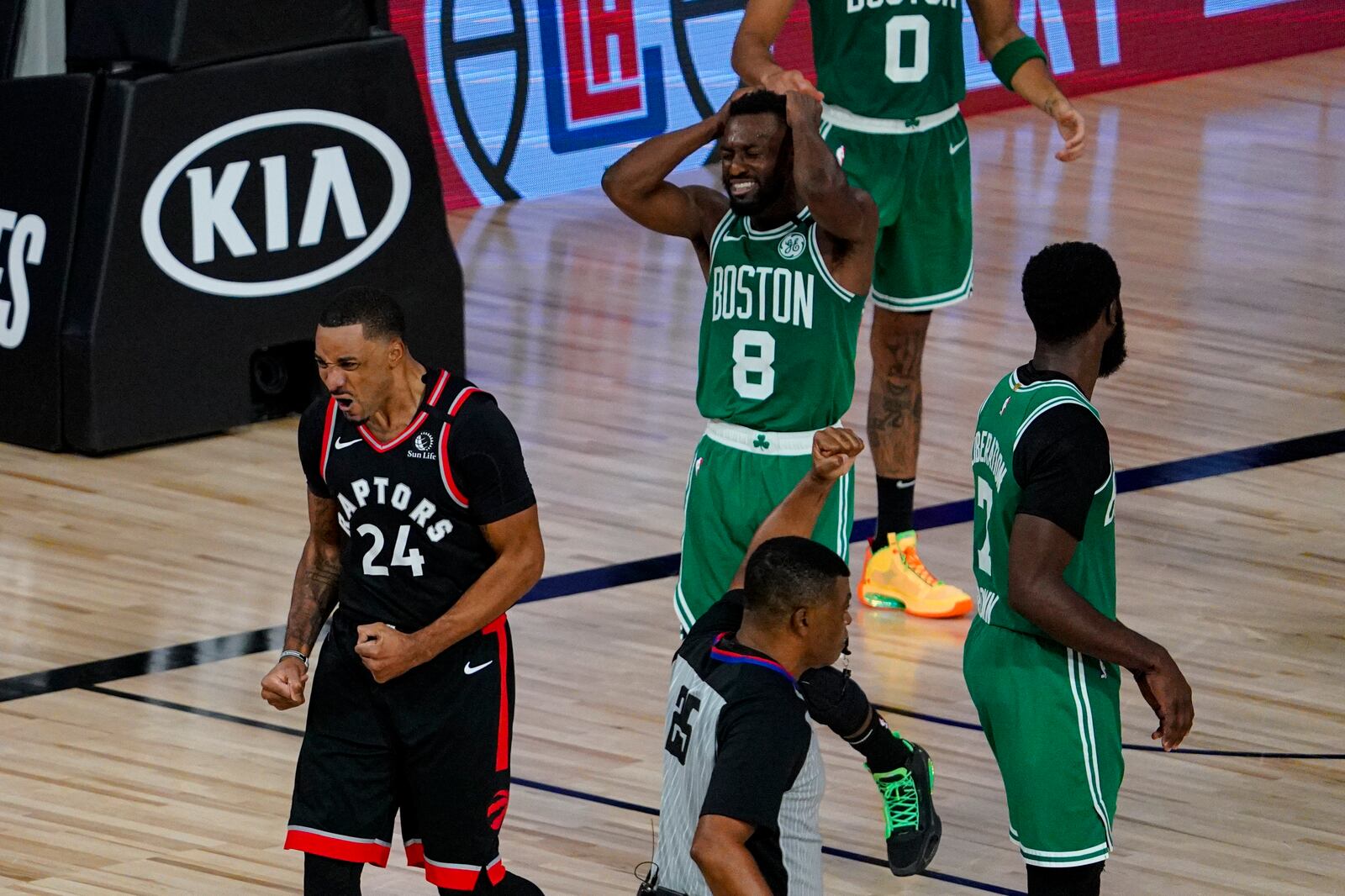 Toronto Raptors guard Norman Powell (24) celebrates after scoring and drawing a foul against the Boston Celtics during the second half of an NBA conference semifinal playoff basketball game Wednesday, Sept. 9, 2020, in Lake Buena Vista, Fla. (AP Photo/Mark J. Terrill)