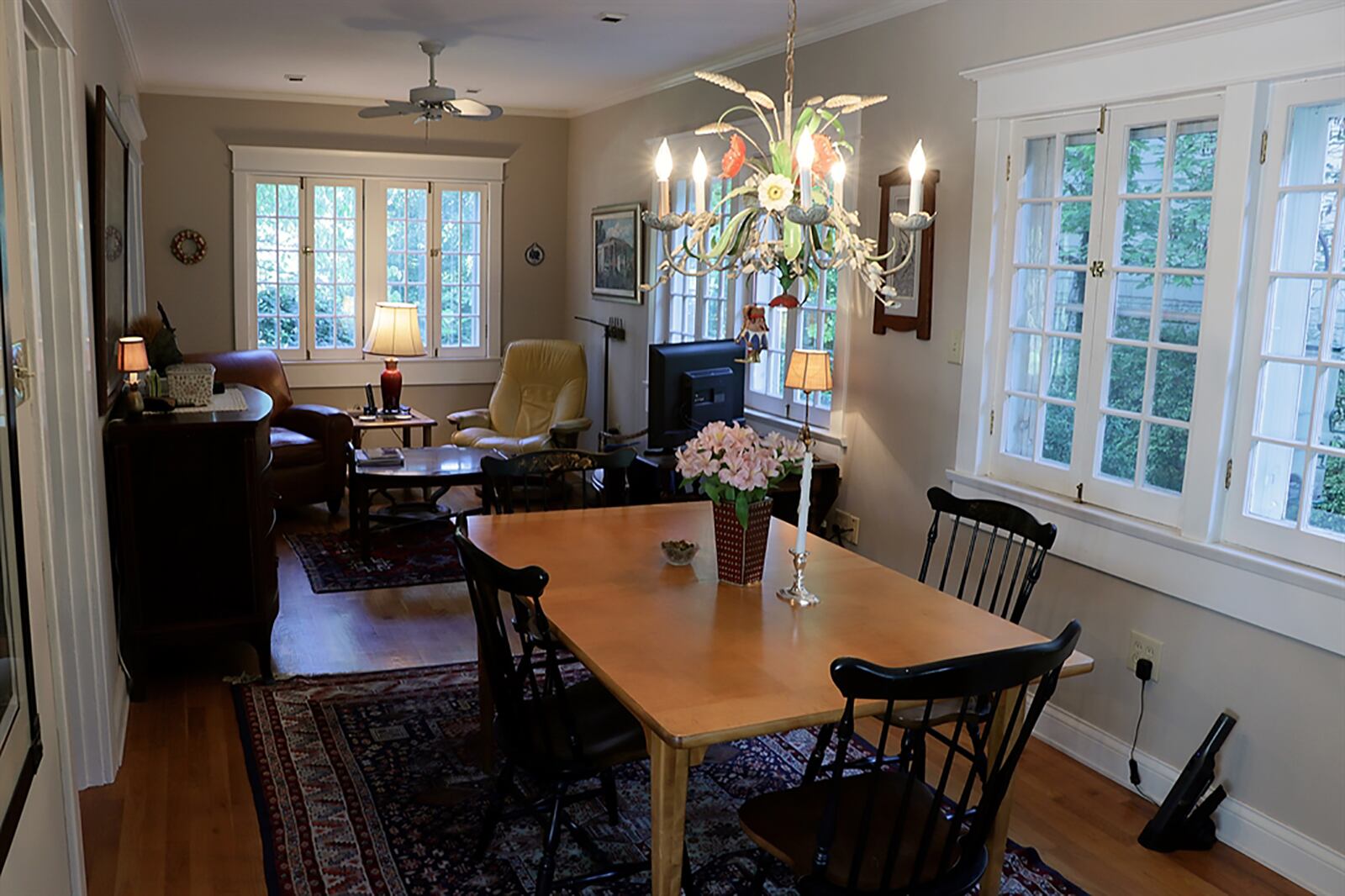 Off the kitchen is a breakfast nook and sitting room with windows that offer panoramic views of the landscaped yard. CONTRIBUTED PHOTO BY KATHY TYLER