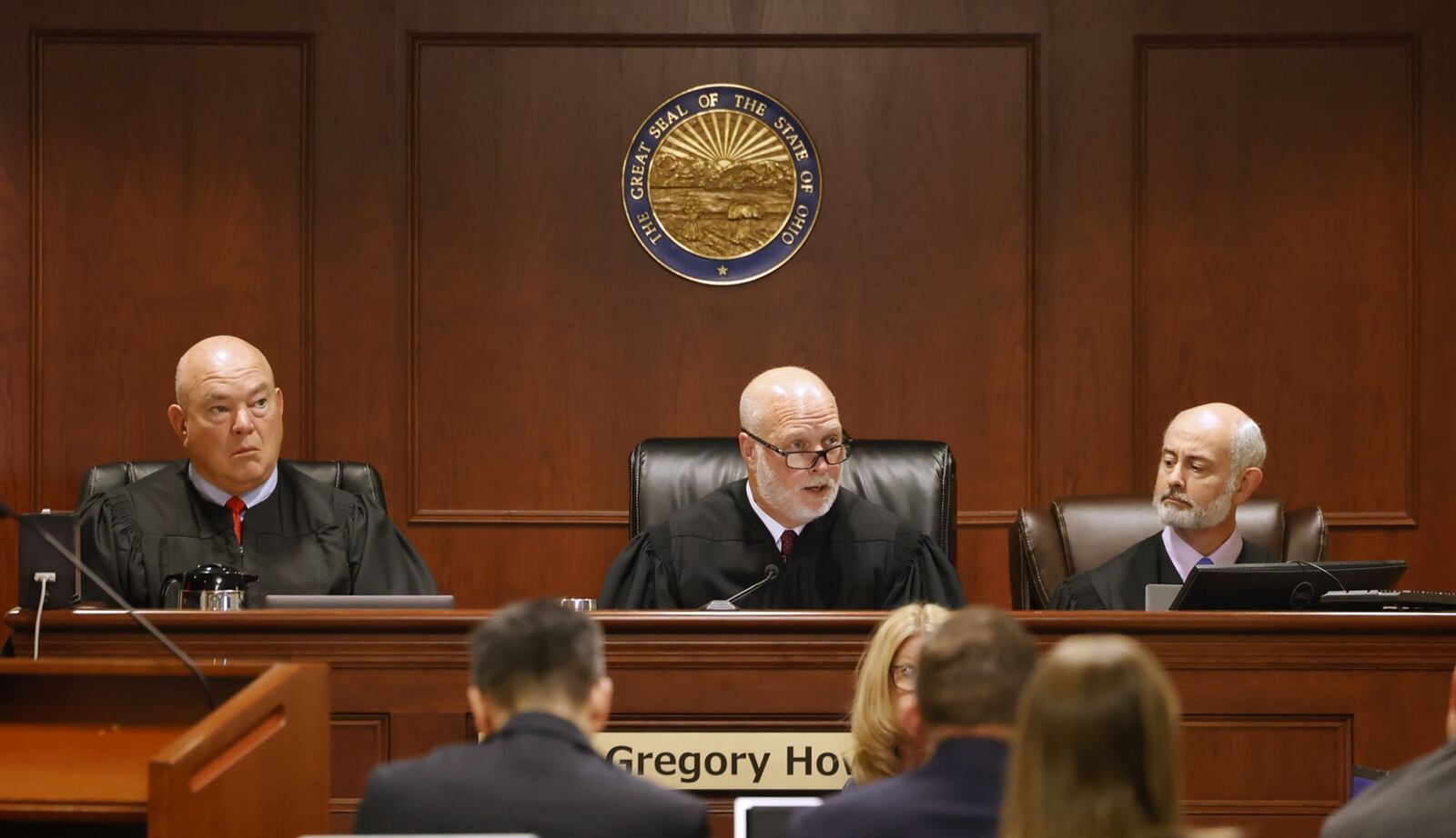 A 3-judge panel of Judges Keith Spaeth, left, Greg Howard, middle, and Greg Stephens hear opening  arguments in the retrial of Gurpreet Singh Monday morning, April 29, 2024 in Butler County Common Pleas Court in Hamilton. He is charged with capital murder for allegedly killing 4 members of his family in 2019 in West Chester Township. NICK GRAHAM/STAFF