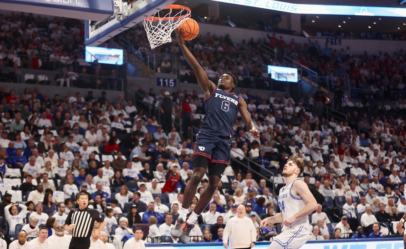 Dayton's Enoch Cheeks scores in the first half against Saint Louis on Friday, Jan. 31, 2025, at Chaifetz Arena in St. Louis, Mo.. David Jablonski/Staff