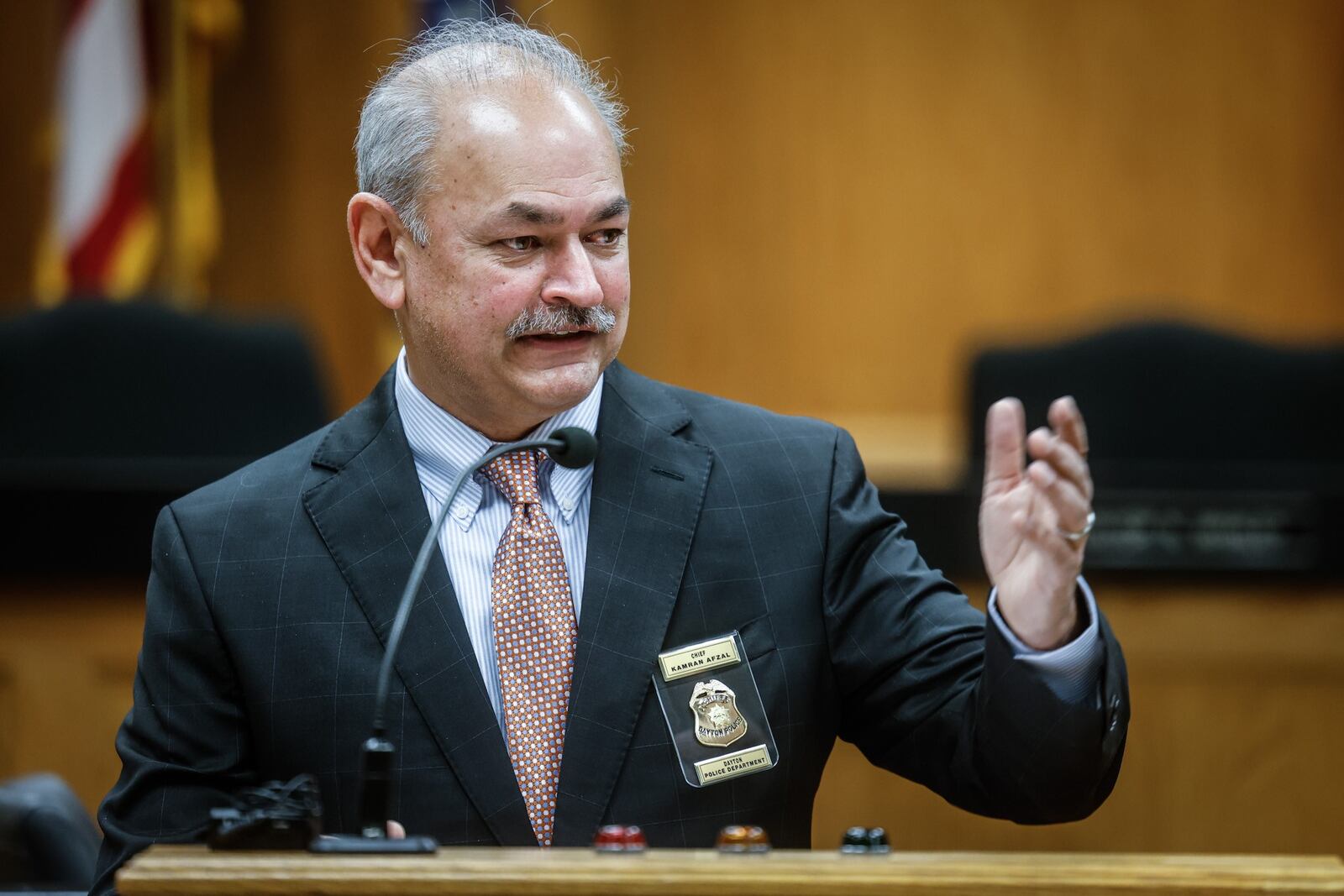 The City of Dayton Commission Chambers was filled Monday morning to welcome the new Director and Chief of Police, Kamran Afzal. The swearing in ceremony was held a 10a.m. and Chief Afzal's family attended. JIM NOELKER/STAFF