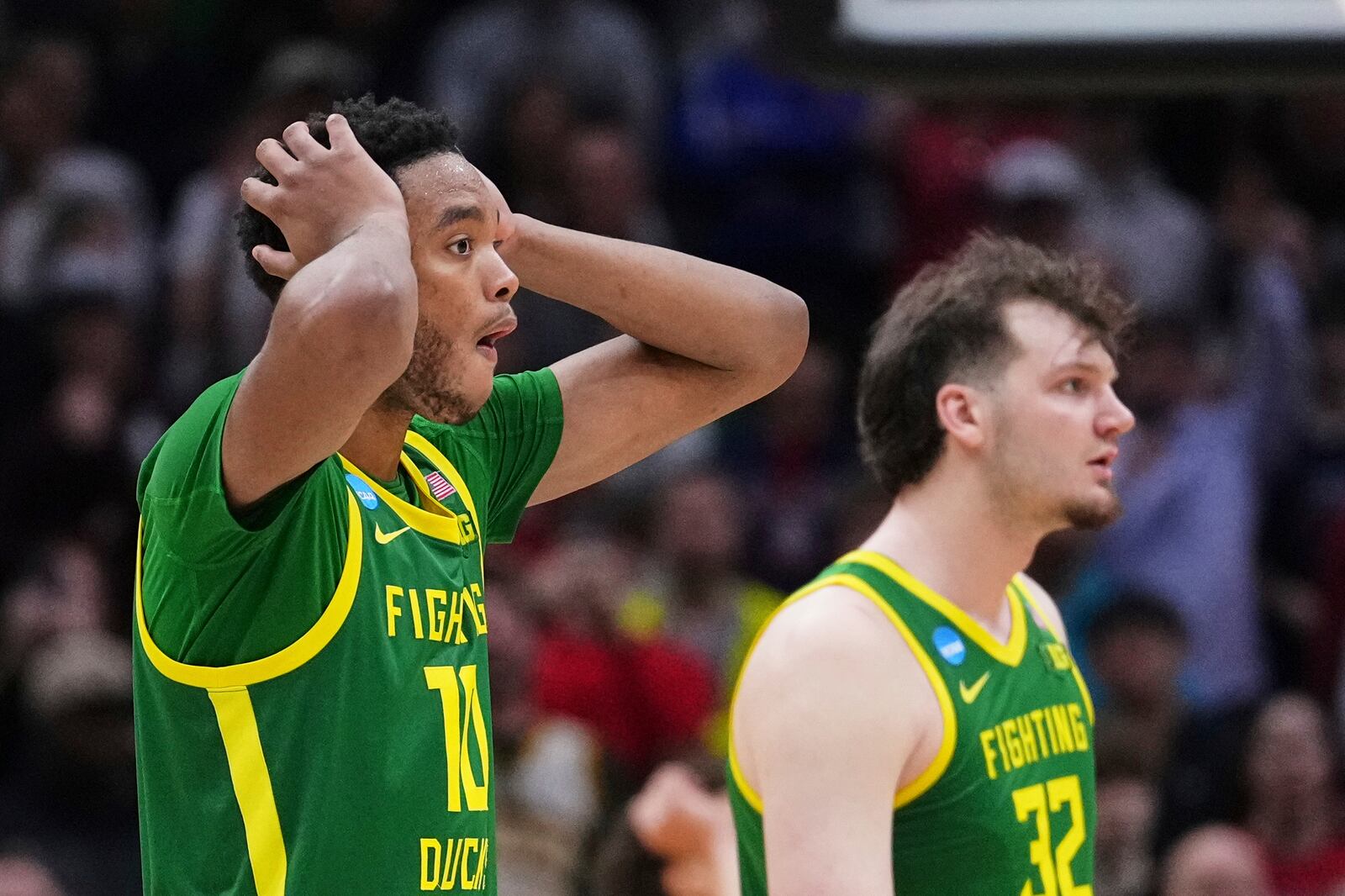 Oregon forward Kwame Evans Jr. reacts to a foul call during the second half in the second round against Arizona of the NCAA college basketball tournament, Sunday, March 23, 2025 in Seattle. (AP Photo/Lindsey Wasson)