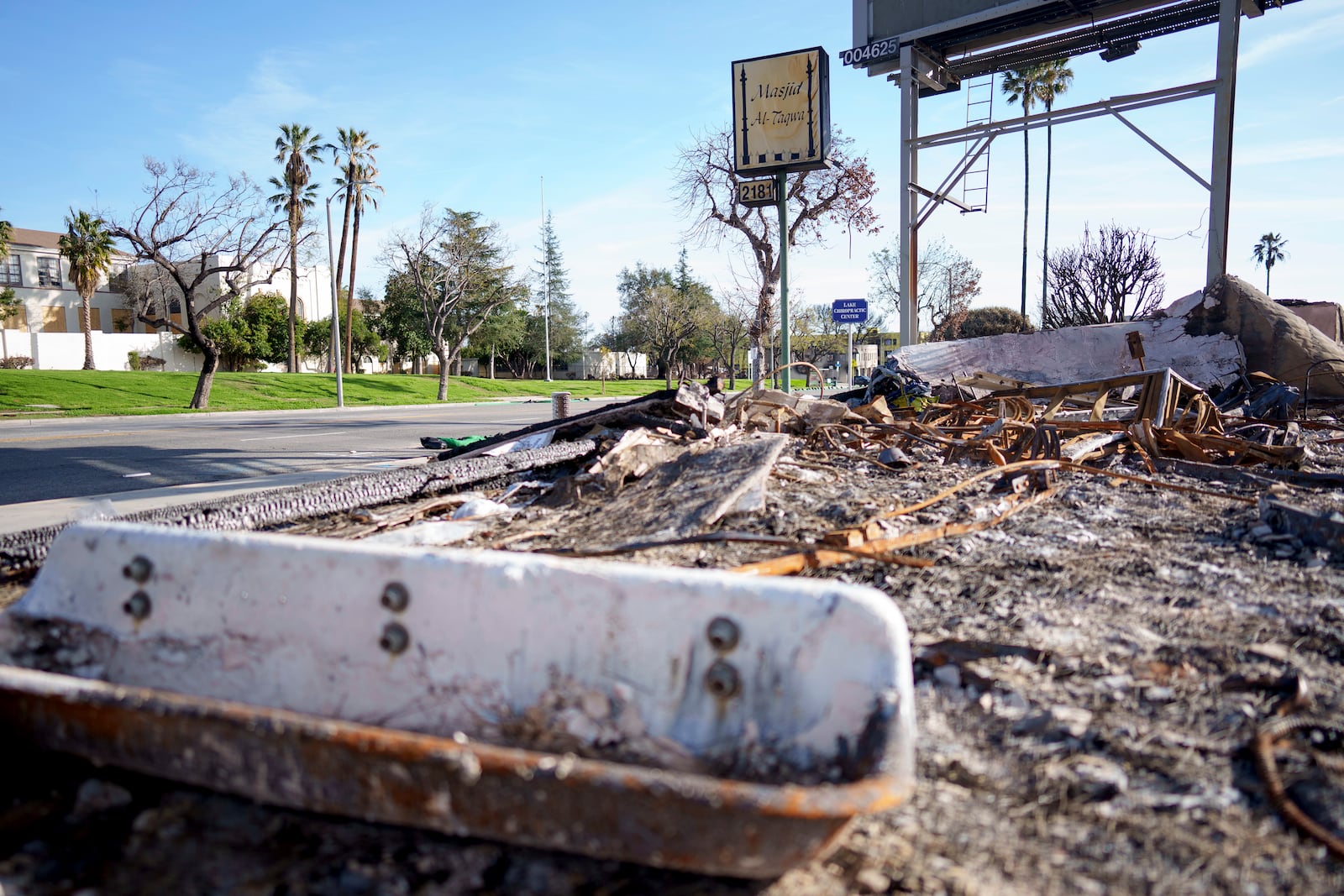 The burned remains of Masjid Al-Taqwa cover the ground in Altadena, California, Saturday, Feb. 15, 2025. (AP Photo/Eric Thayer)