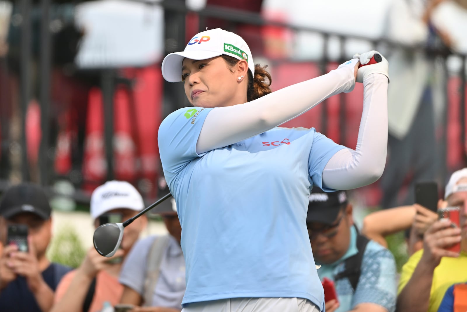 Ariya Jutanugarn of Thailand watches her shot on the 1st hole during the first round of the LPGA Honda Thailand golf tournament in Pattaya, southern Thailand, Thursday, Feb. 20, 2025. (AP Photo/Kittinun Rodsupan)