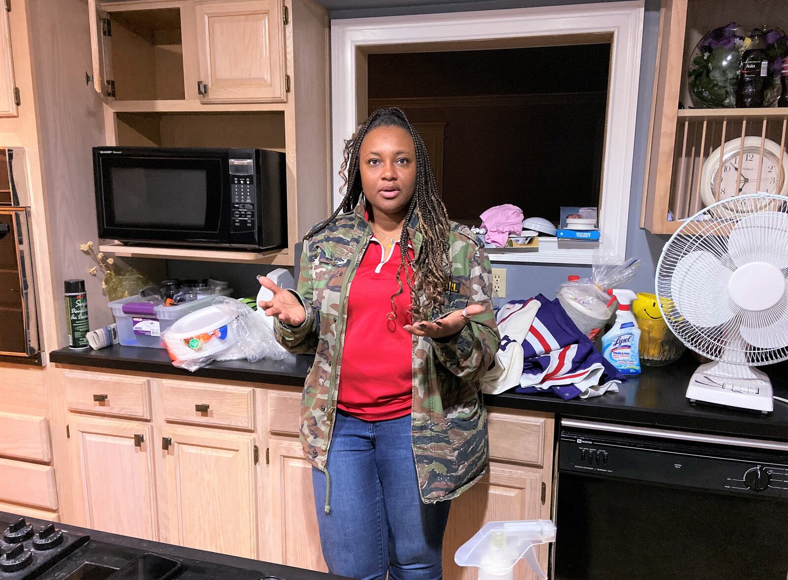 Tosha Johnson on Monday stands in the kitchen of her parents' home in Trotwood while discussing the severe damage the 3,500 square foot house sustained during the Memorial Day Tornado struck. ISMAIL TURAY JR./STAFF