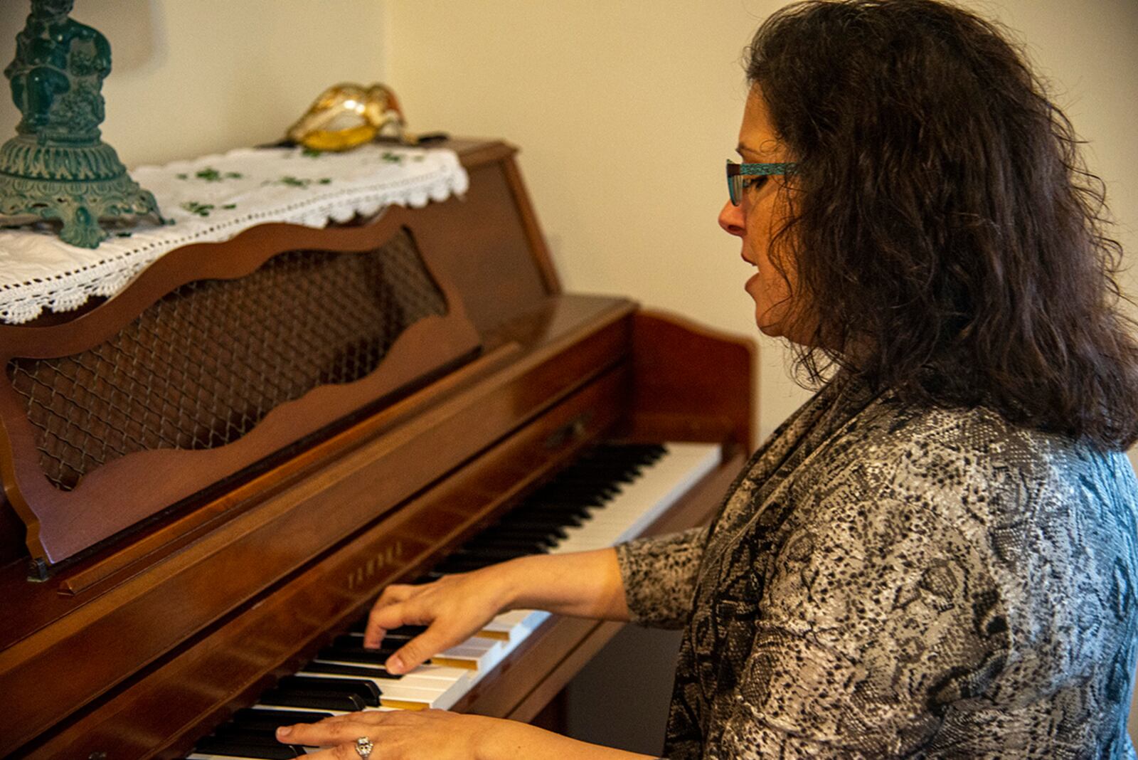 Lily Rose plays “Miriam” from her album, “See You Again,” at her home in Beavercreek on Oct. 21. The song was inspired by her daughter, Miriam. U.S. AIR FORCE PHOTO/SENIOR AIRMAN JACK GARDNER