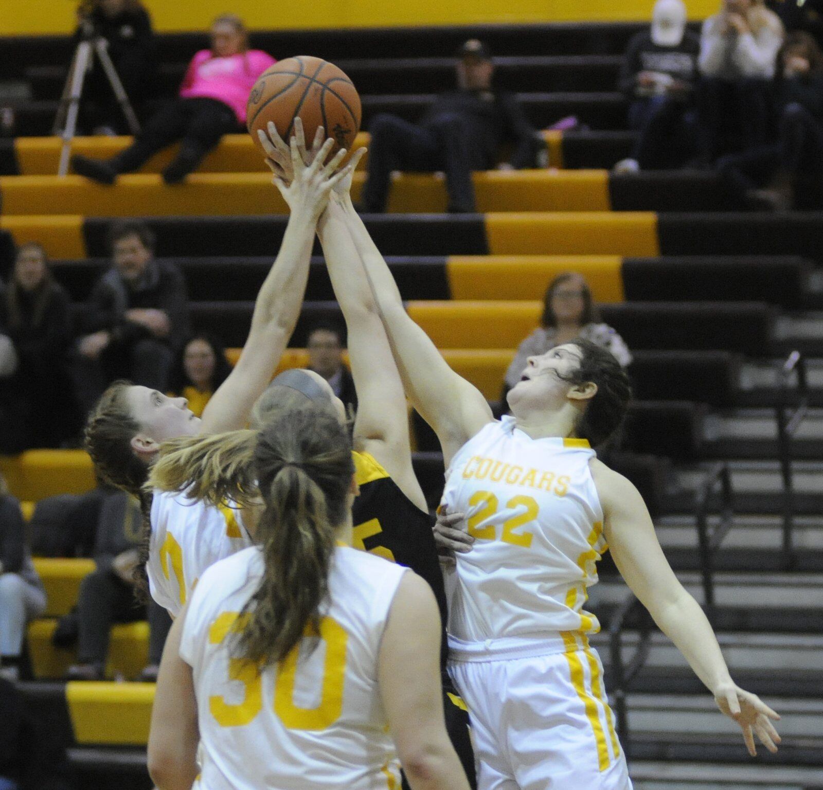 Kenton Ridge teammates Kirsten Wiley (2), Mikala Morris (30) and Mallery Armentrout battle Grace Stoller of Centerville for a rebound. Centerville defeated host Kenton Ridge 61-46 in a girls high school basketball game on Thursday, Jan. 3, 2019. MARC PENDLETON / STAFF