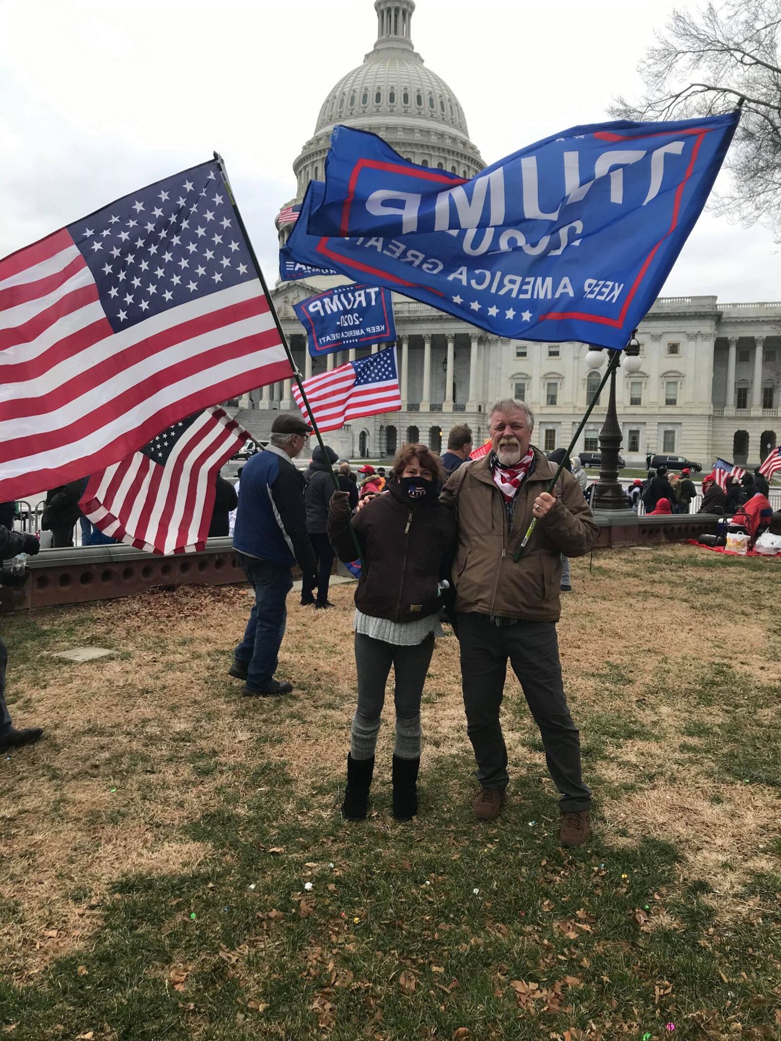 Miamisburg residents Rhonda and Greg Dulin pose for a photo outside the U.S. Capitol in Washington D.C. around 11 a.m. Wednesday, Jan. 6, 2021, before the scene devolved into chaos. Greg Dulin said the actions of those who did so  took things "way too far." CONTRIBUTED