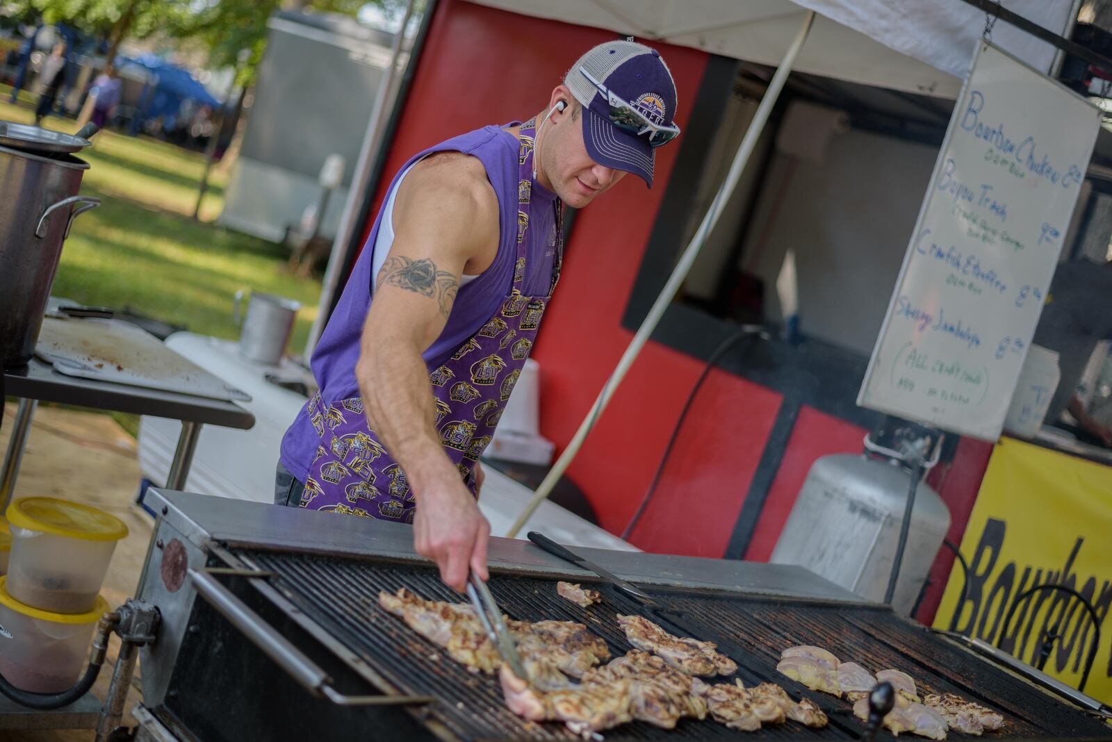 It was a milestone year in more ways than one for the Tipp City Mum Festival. The annual salute to everything mums celebrated its 60th year Friday through Sunday with activities ranging from a massive Friday night car show to a parade down Main Street and two days of entertainment, food and arts and crafts at Tipp City Park. TOM GILLIAM / CONTRIBUTING PHOTOGRAPHER