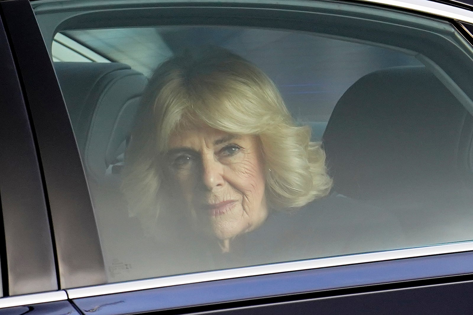 Britain's Queen Camilla arrives at Buckingham Palace in London, Tuesday, Dec. 3, 2024. (AP Photo/Alberto Pezzali)