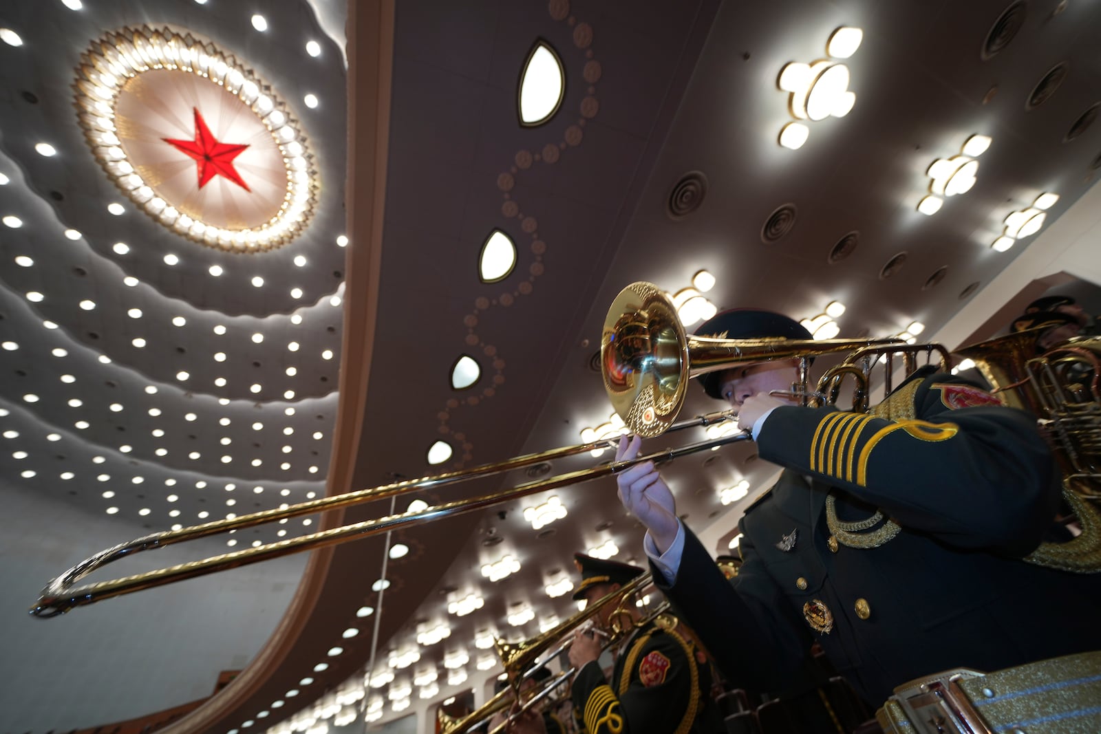 Chinese band members rehearse for the opening of the Chinese People's Political Consultative Conference held at the Great Hall of the People in Beijing, Tuesday, March 4, 2025. (AP Photo/Ng Han Guan)