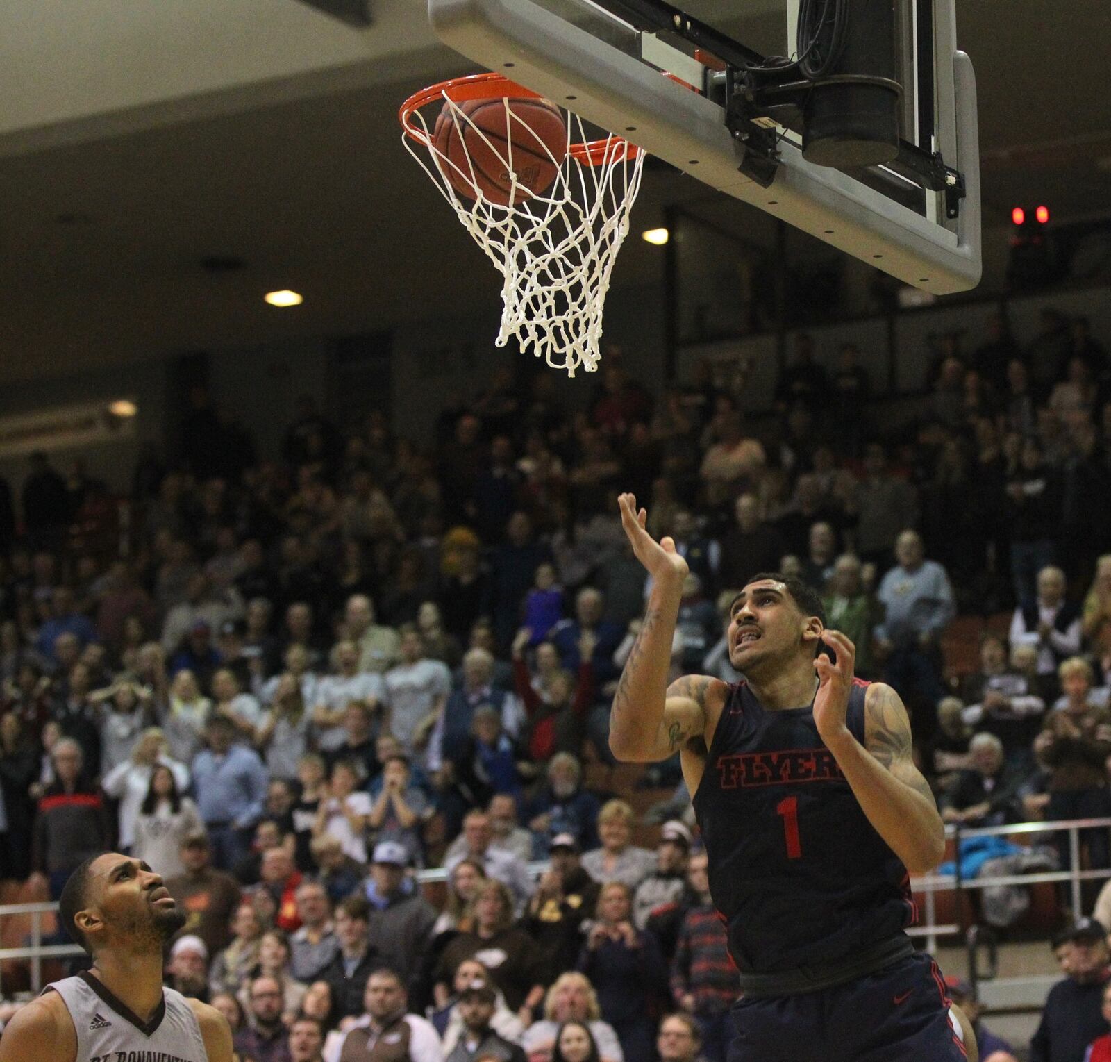 Dayton’s Obi Toppin scores in the final minute of the second half against St. Bonaventure on Saturday, Jan. 19, 2019, at the Reilly Center in Olean, N.Y.