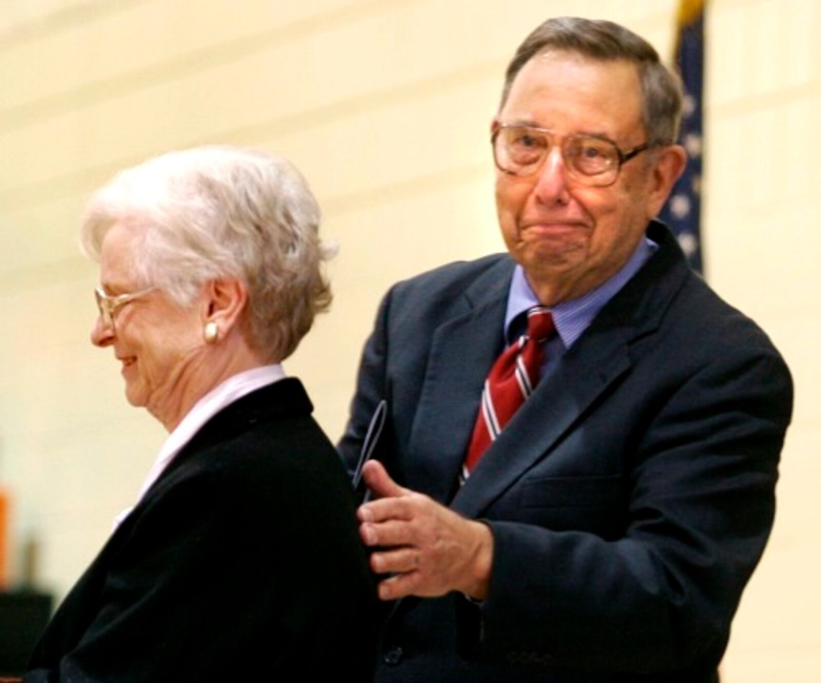 Dayton Schools and arts supporter Doris Ponitz is introduced by her husband David Ponitz, who served as chair of Citizens for Neighborhood Schools, before speaking at Sunday's dedication ceremony.