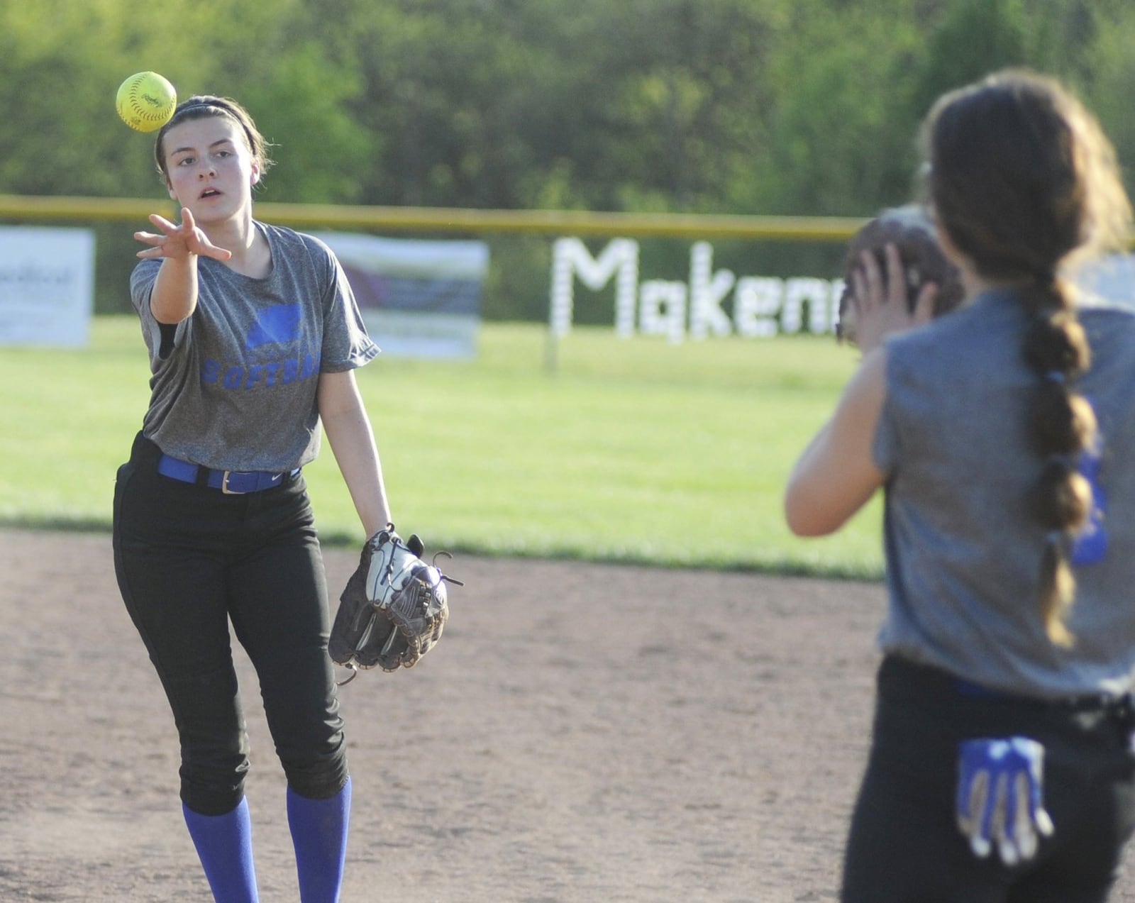 Springboro junior second baseman Gabby Hougan (left) tosses to senior first baseman Sarah Metcalfe for the final out in a 10-1 second-round defeat of visiting Springfield on Wednesday, May 8, 2019. MARC PENDLETON / STAFF