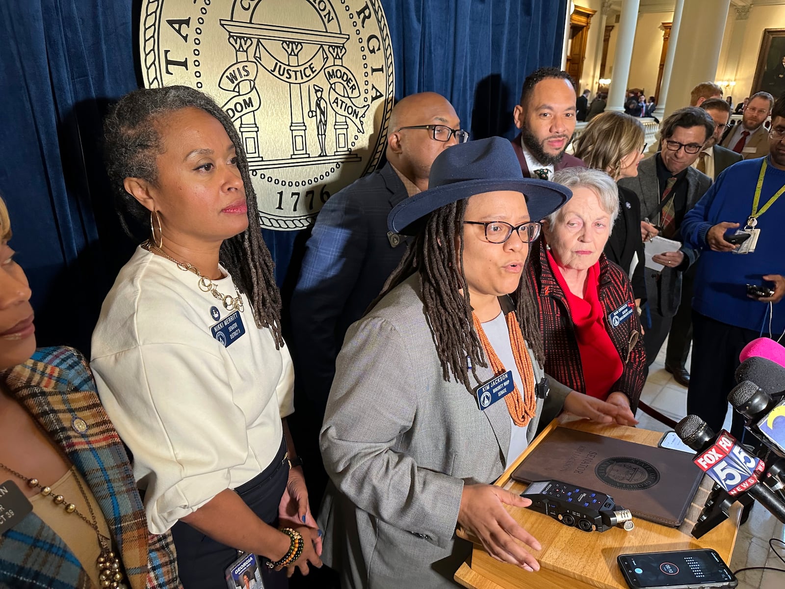 Senate Minority Whip Kim Jackson (D-Stone Mountain) speaks to reporters following Senate passage of a bill limiting state funding of gender affirming care on Tuesday, Feb. 11, 2025, at the Georgia Capitol in Atlanta. (AP Photo/Jeff Amy)