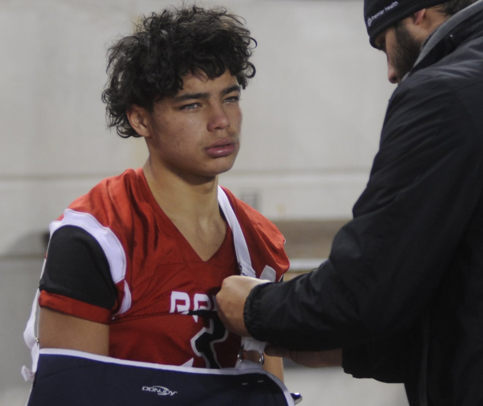 Trotwood QB Markell Stephens-Peppers was knocked out of the game with a shoulder injury. Akron Archbishop Hoban defeated Trotwood-Madison 30-0 in the Division III high school football state championship at Ohio Stadium in Columbus on Saturday, Dec. 3, 2016. MARC PENDLETON / STAFF