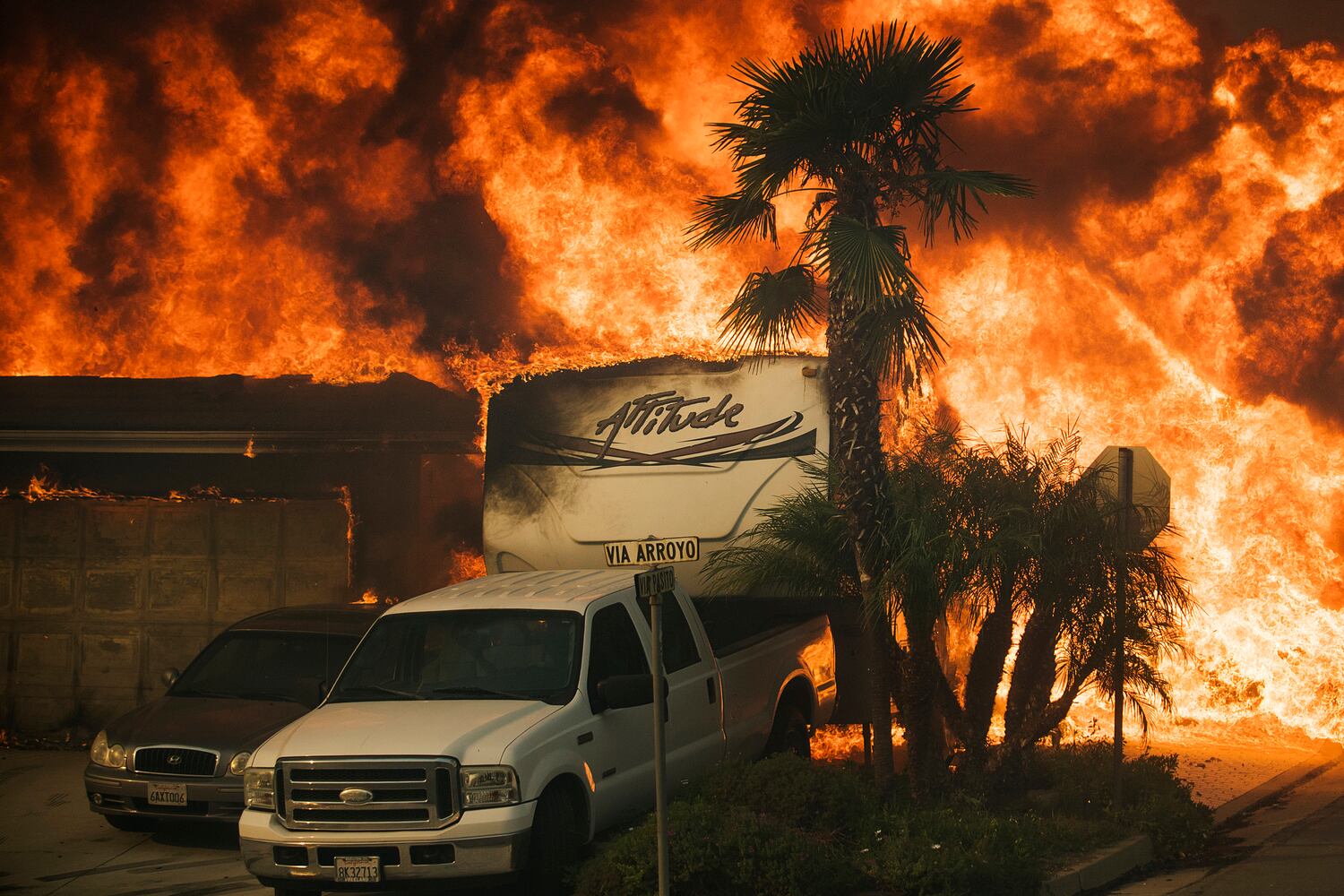 Winds whip up California fires, prompting evacuations