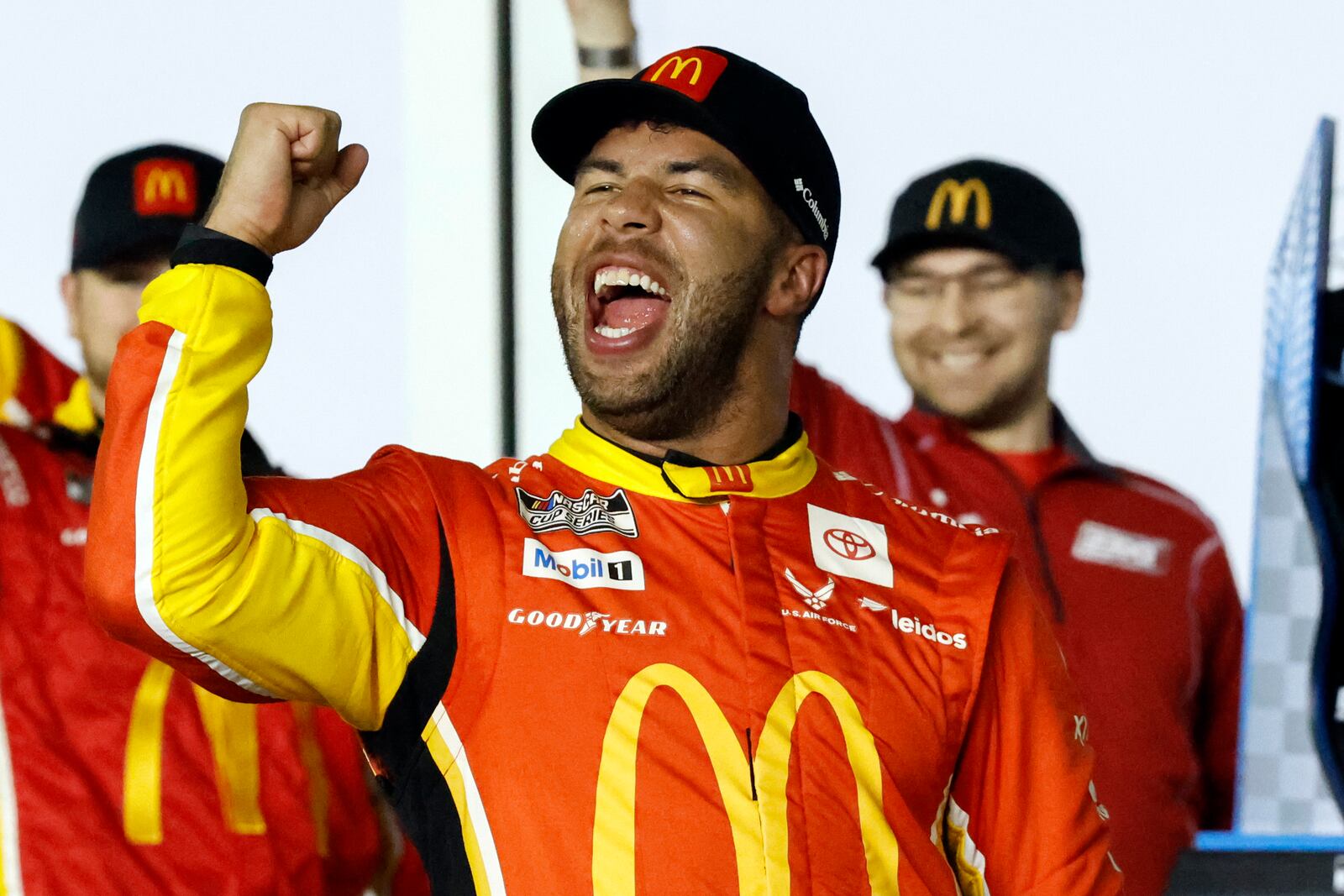 Bubba Wallace celebrates in Victory Lane after winning the first of two NASCAR Daytona 500 qualifying auto races at Daytona International Speedway, Thursday, Feb. 13, 2025, in Daytona Beach, Fla. (AP Photo/Terry Renna)