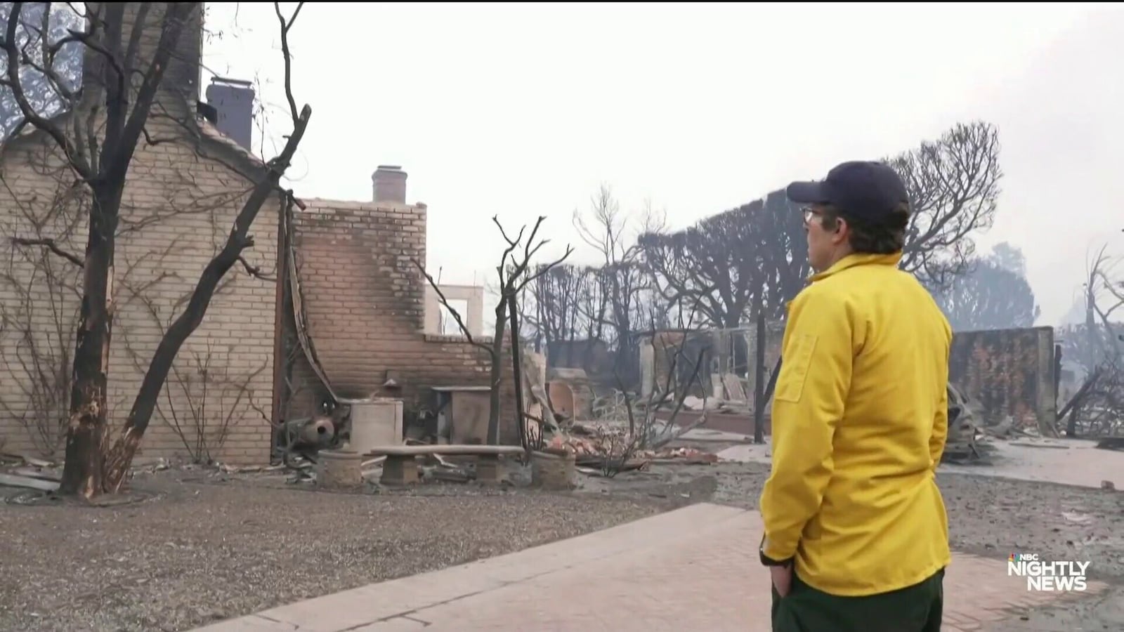 This image provided by NBC shows reporter Jacob Soboroff in front of the burnt-out home where grew up in Pacific Palisades, Calif., Wednesday, Jan. 8, 2025. (NBC via AP)