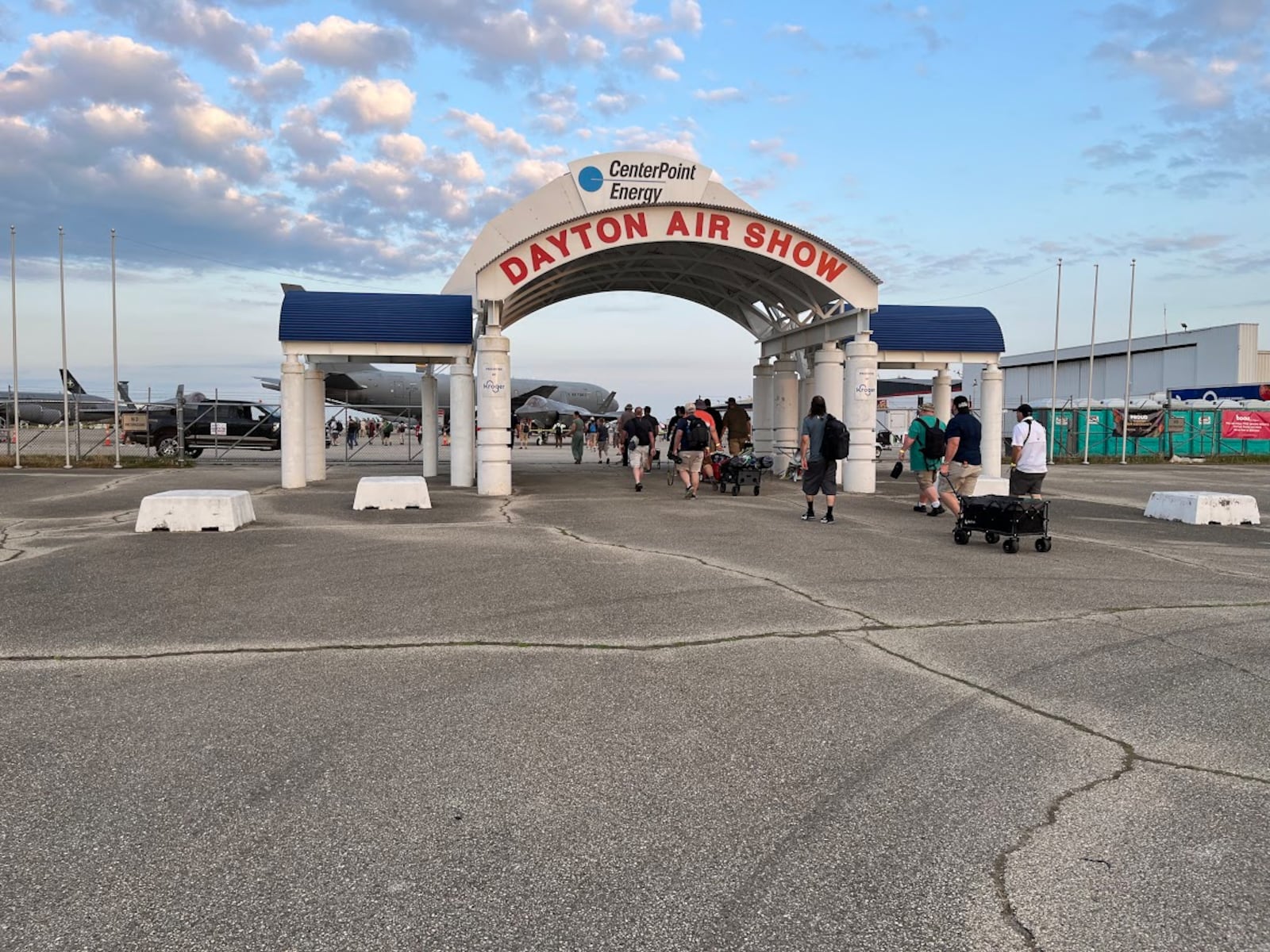 Some of the first photo tour groups make their way on to the Dayton Air Show grounds early Saturday. Gates for general admission ticket holders will open at 9 a.m. THOMAS GNAU/STAFF