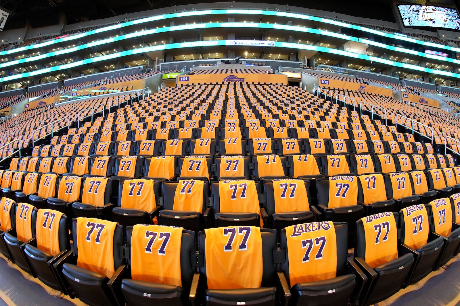 T-shirts with Los Angeles Lakers guard Luka Doncic's number are seen played out on fan seats prior to an NBA basketball game between the Lakers and the Utah Jazz Monday, Feb. 10, 2025, in Los Angeles. (AP Photo/Mark J. Terrill)