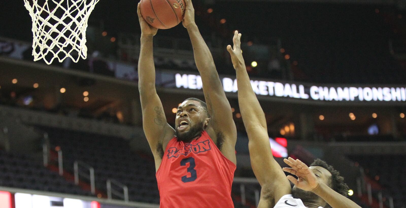 Dayton's Trey Landers dunks against Virginia Commonwealth on Thursday, March 8, 2018, at Capital One Arena in Washington, D.C.