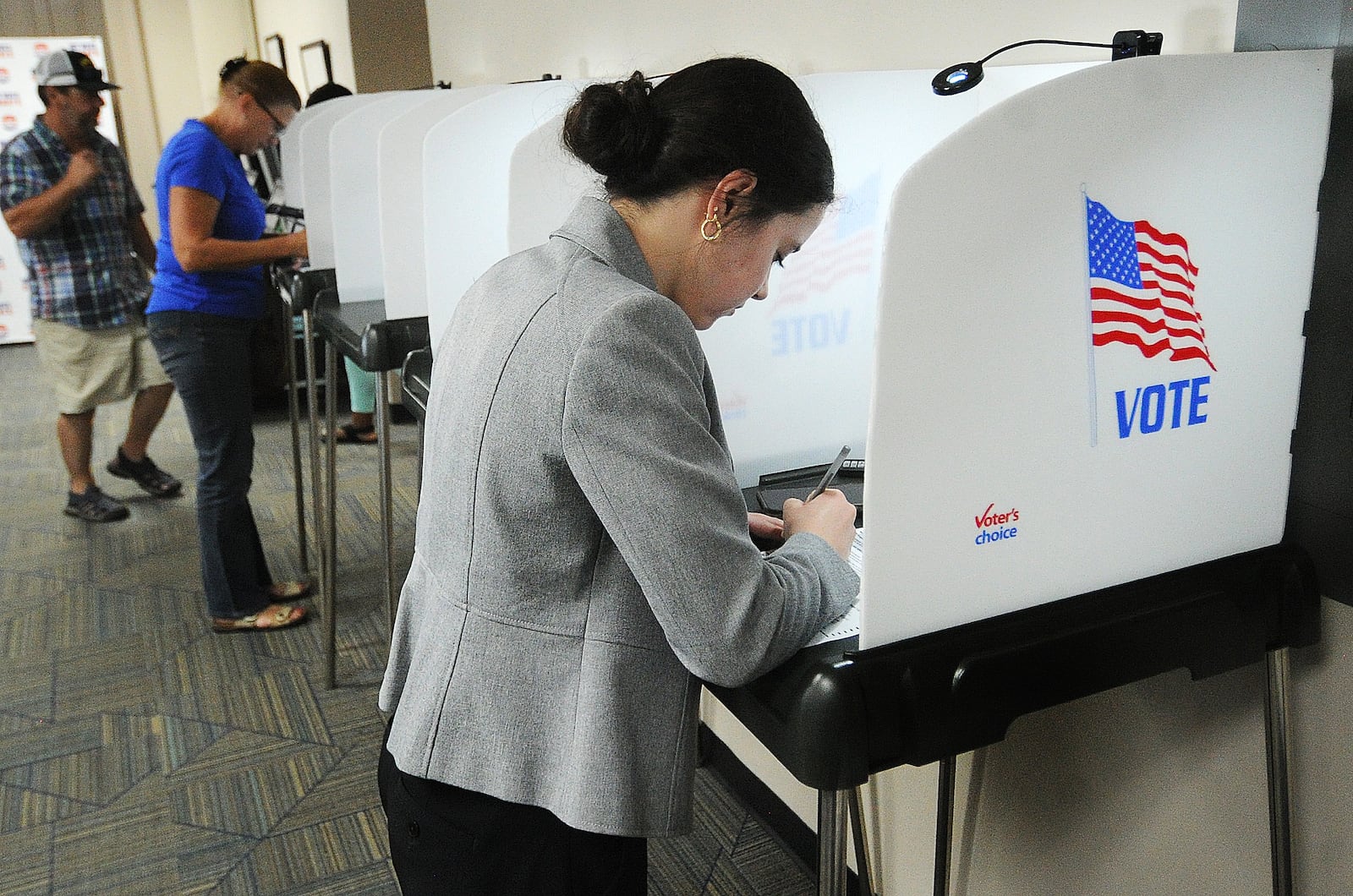 Maddie Logan votes Friday, July 28, 2023 at the Miami County board of elections office in Troy. MARSHALL GORBY\STAFF