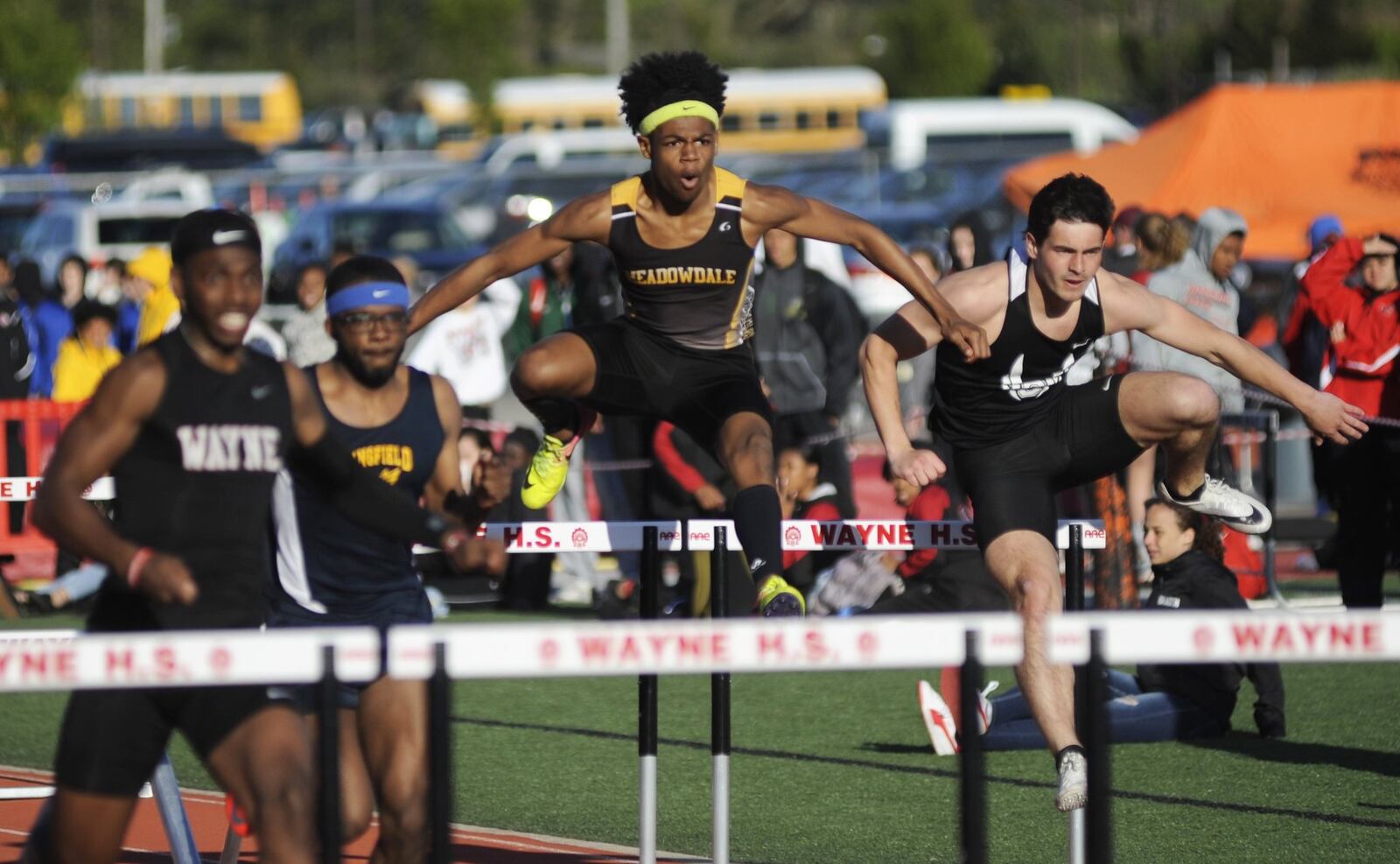 JaVan Poole of Meadowdale (middle) rises above the rest of the 110 high hurdles field during the Wayne Inv. on Friday, April 26, 2019. MARC PENDLETON / STAFF