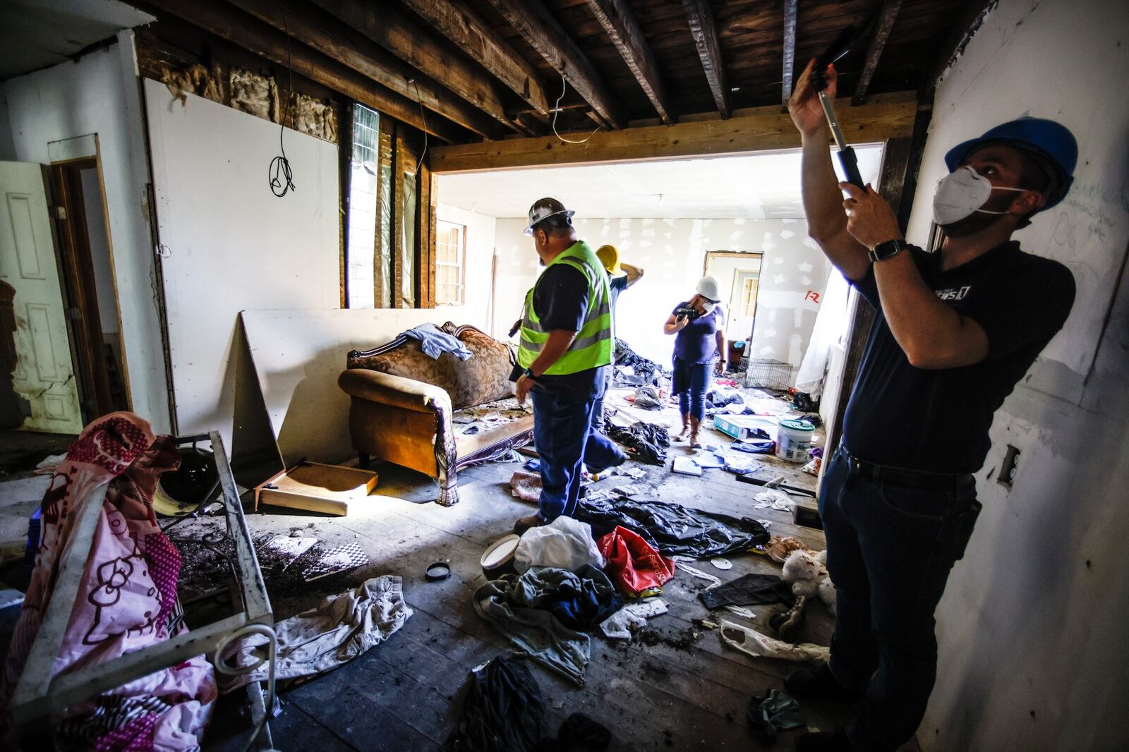 Before the nuisance house on Chapel St. was demolished Tuesday June 21, members of the media were invited into the structure. The city is preparing to spend more than $15 million of its federal rescue funds on blight demolition  JIM NOELKER/STAFF