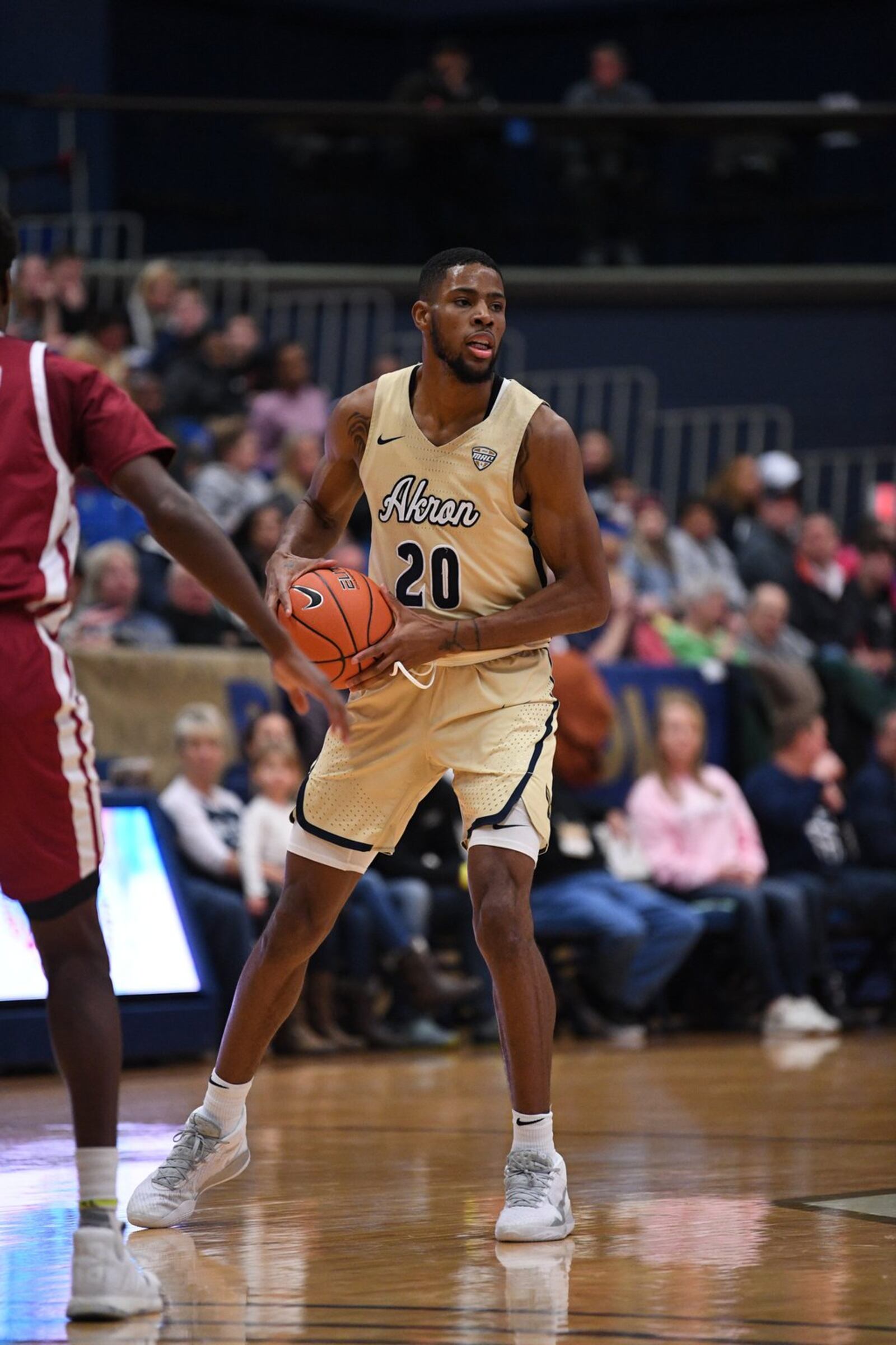 Akron’s Xeyrius Williams looks to make a pass vs. UMass earlier this season. University of Akron photo