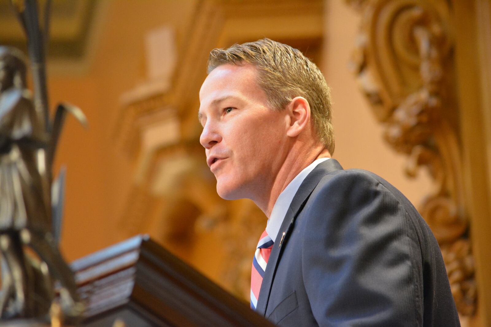 Ohio Secretary of State Jon Husted Ohio Secretary of State Jon Husted gave brief remarks during the 54th Ohio Electoral College meeting in the Ohio Statehouse Senate chambers on Dec. 19, 2016. JIM OTTE / STAFF