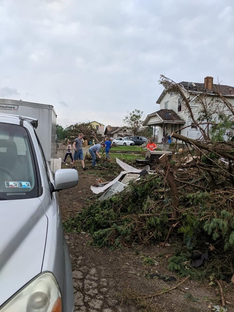 Photos: Community rallies around Dayton restaurant owner after son’s death, tornado